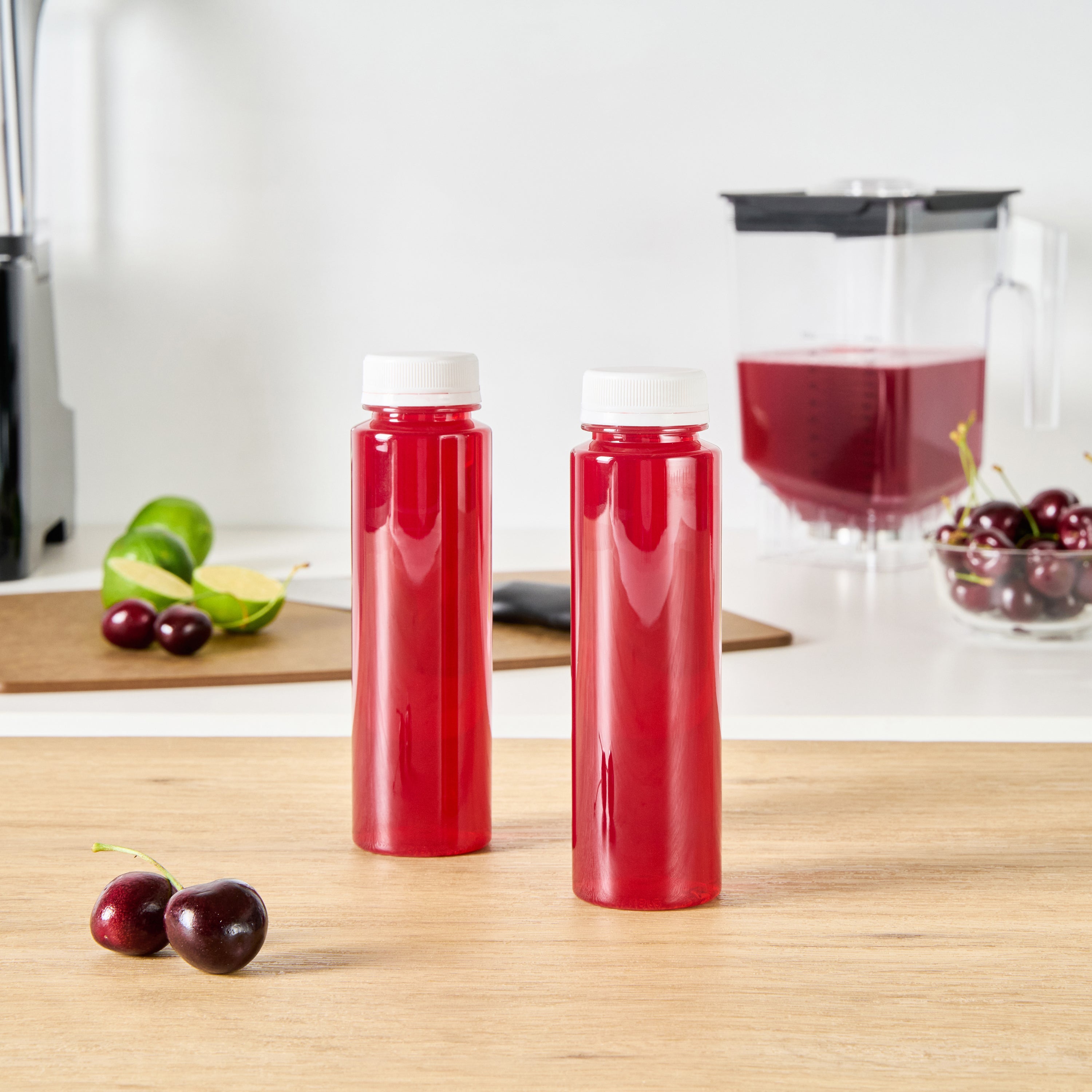 Bottle Tek 8 oz Round Clear Plastic Cold Pressed Juice Bottle - with Safety Cap - 2" x 2" x 6 3/4" - 100 count box