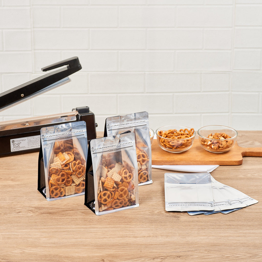 Bag Tek Black Plastic Medium Snack Bag - Double Seal, Rip Lock, Heat Sealable - 8" x 5" x 3 1/4" - 100 count box