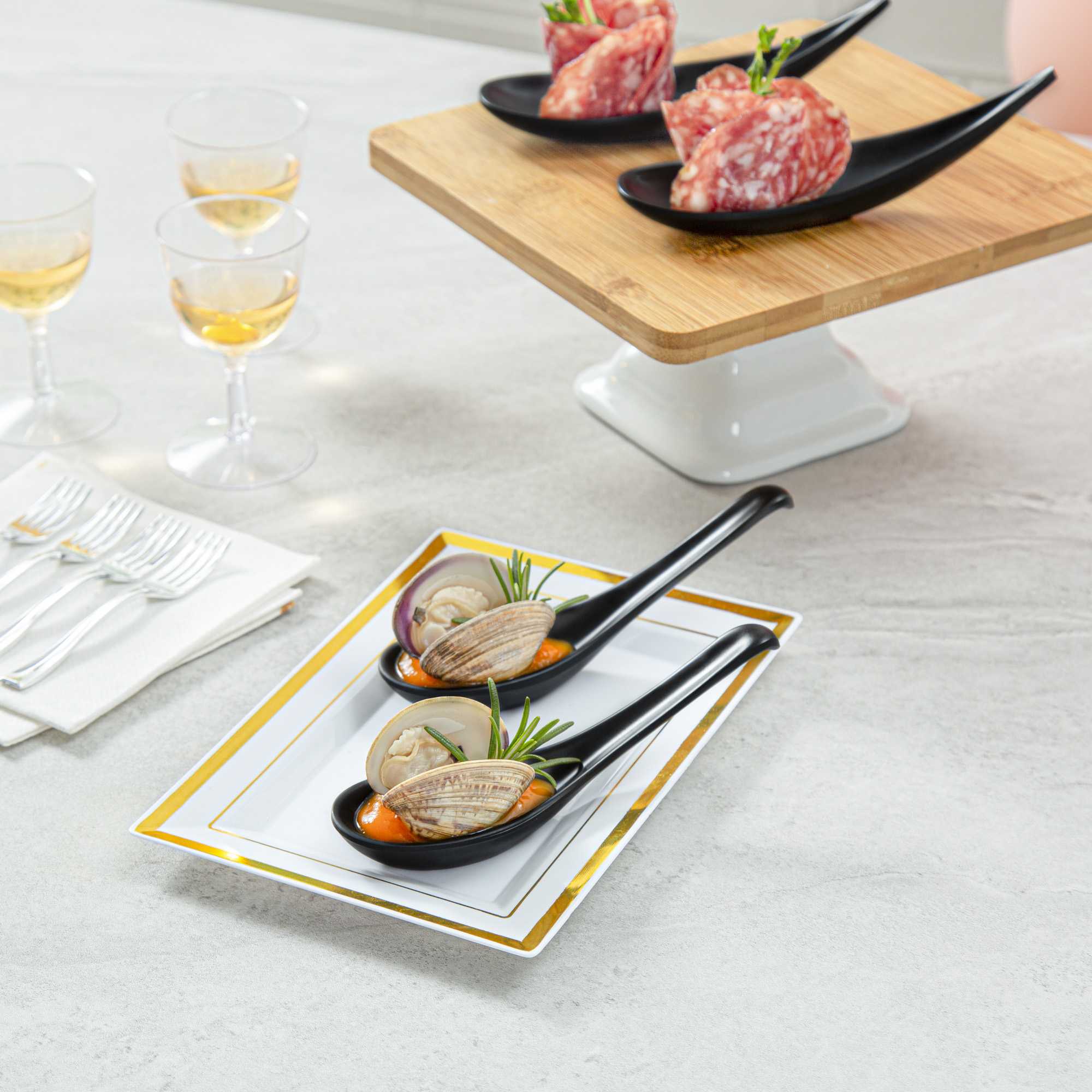 Voga 1 oz Black Melamine Tasting Spoon - Japonais, Curva - 5 3/4" x 1 1/2" x 1" - 10 count box
