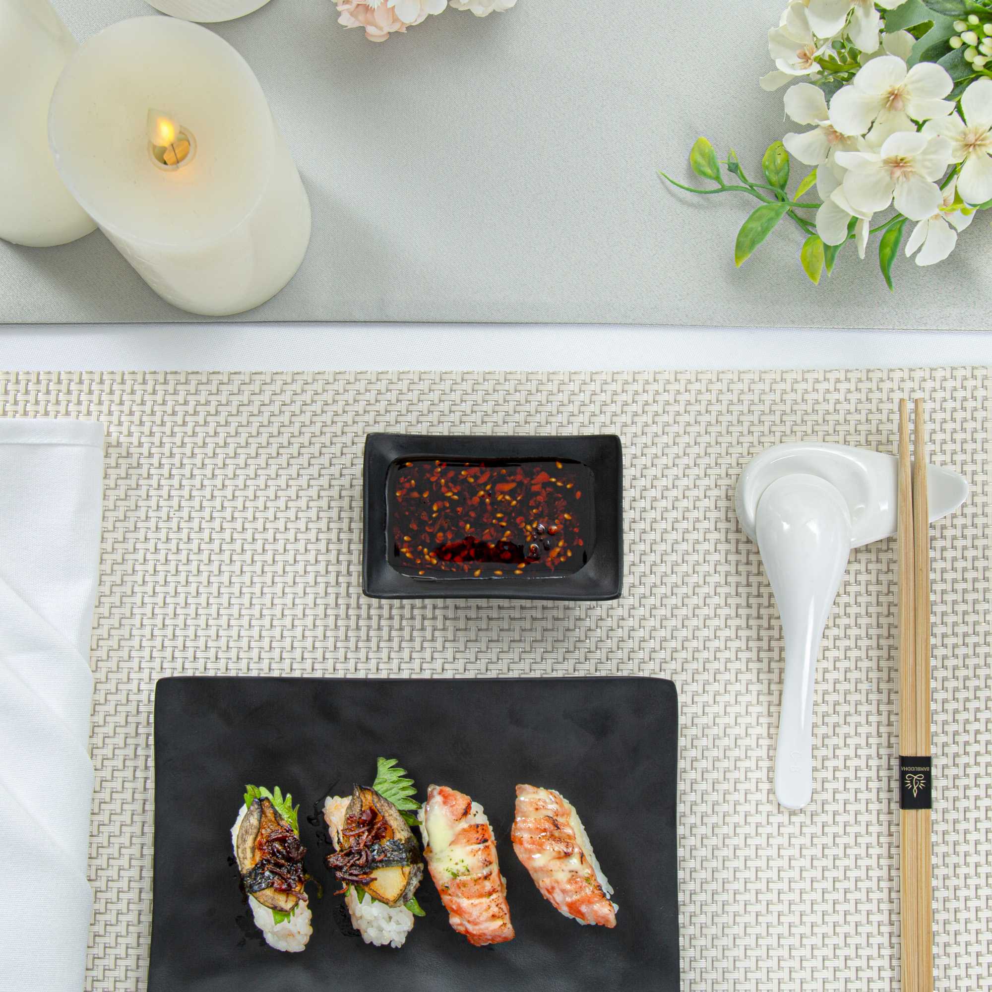 Voga 1 oz Rectangle Black Melamine Sauce Dish - Japonais - 4" x 2 1/2" x 1 1/4" - 10 count box