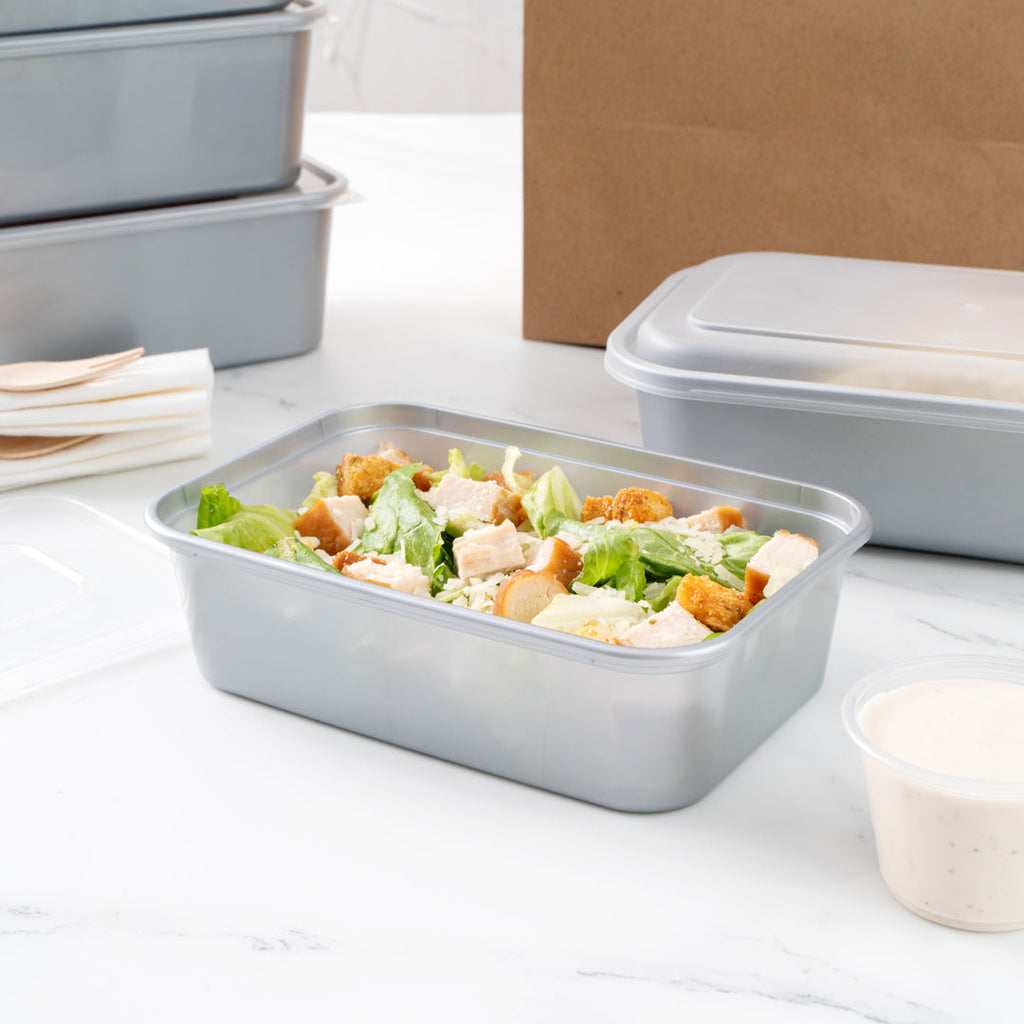 Futura 22 oz Silver Plastic Take Out Container - with Clear Lid, Microwavable - 6 3/4" x 4 1/2" x 2 1/4" - 100 count box