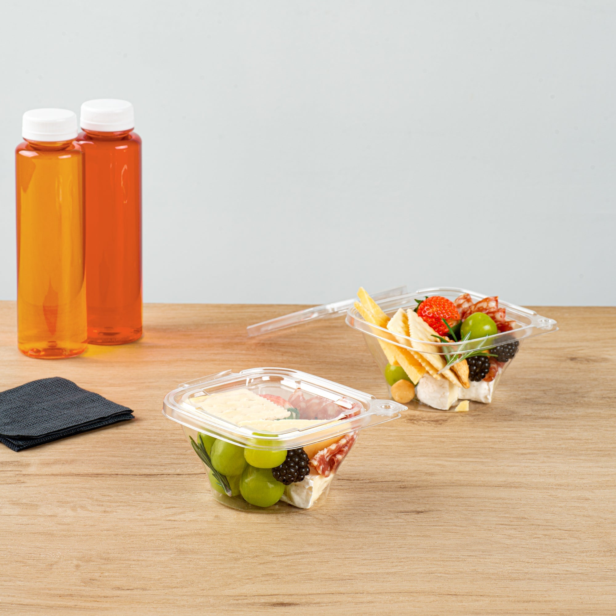 Tamper Tek 8 oz Square to Round Clear Plastic Deli / Snack Container - with Lid, Tamper-Evident - 4 3/4" x 5" x 1 3/4" - 100 count box
