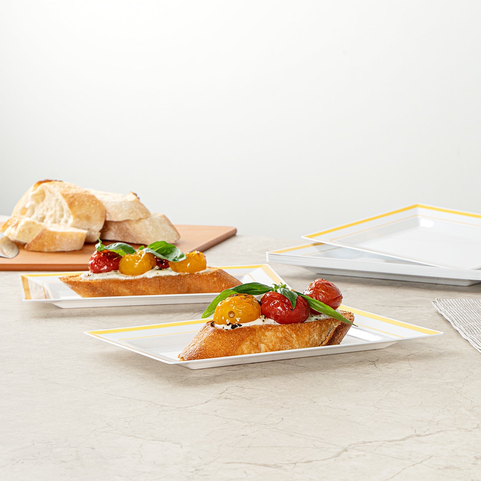 Moderna Rectangle White Plastic Gold-Rimmed Plate - 7 1/2" x 5 1/4" x 1/2" - 100 count box