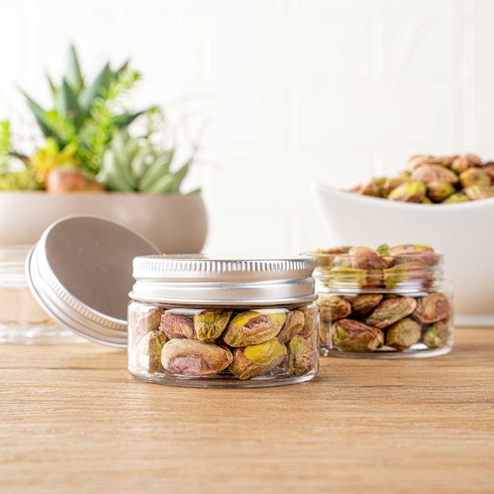 Chef 101 1 oz Round Clear Plastic Candy and Snack Jar - with Silver Aluminum Lid - 2" x 2" x 1 1/4" - 100 count box