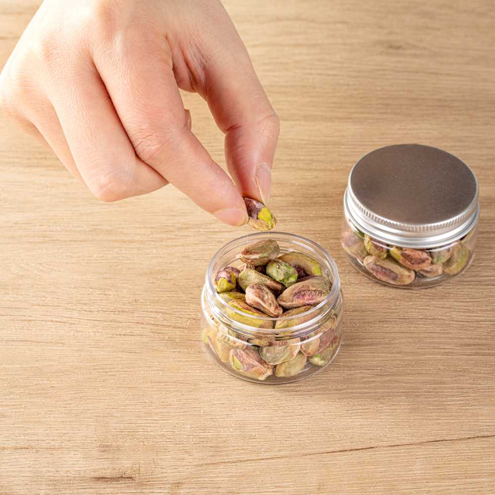 Chef 101 1 oz Round Clear Plastic Candy and Snack Jar - with Silver Aluminum Lid - 2" x 2" x 1 1/4" - 100 count box
