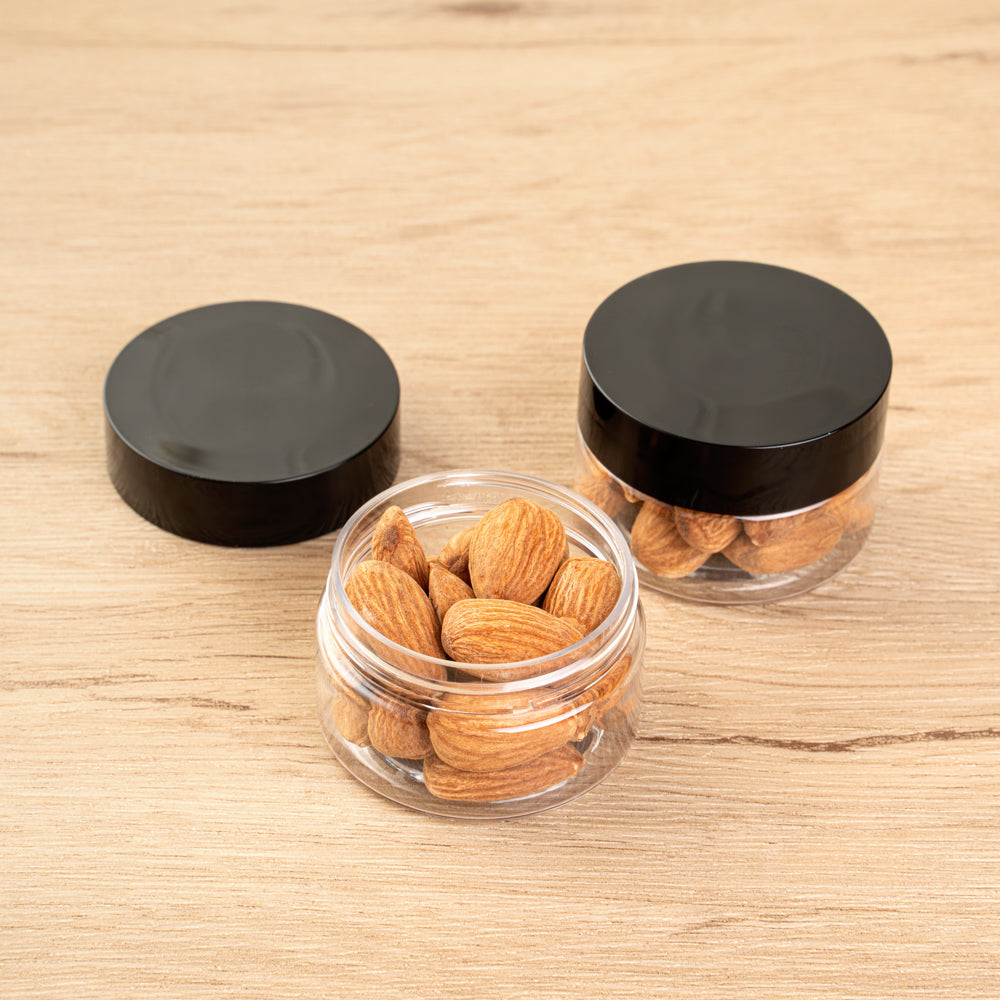 Chef 101 1 oz Round Clear Plastic Candy and Snack Jar - with Black Plastic Lid - 2" x 2" x 1 1/4" - 10 count box