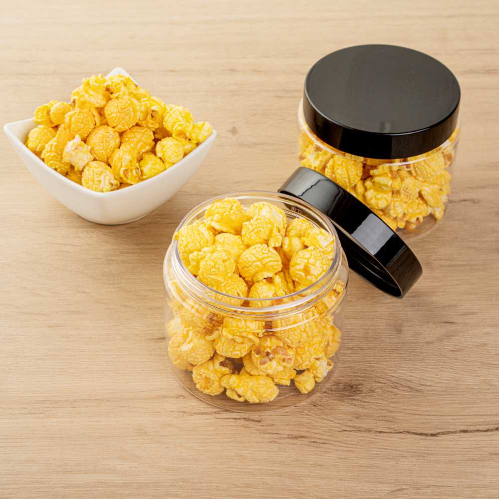 Chef 101 16 oz Round Clear Plastic Candy and Snack Jar - with Black Plastic Lid - 3 3/4" x 3 3/4" x 3" - 100 count box