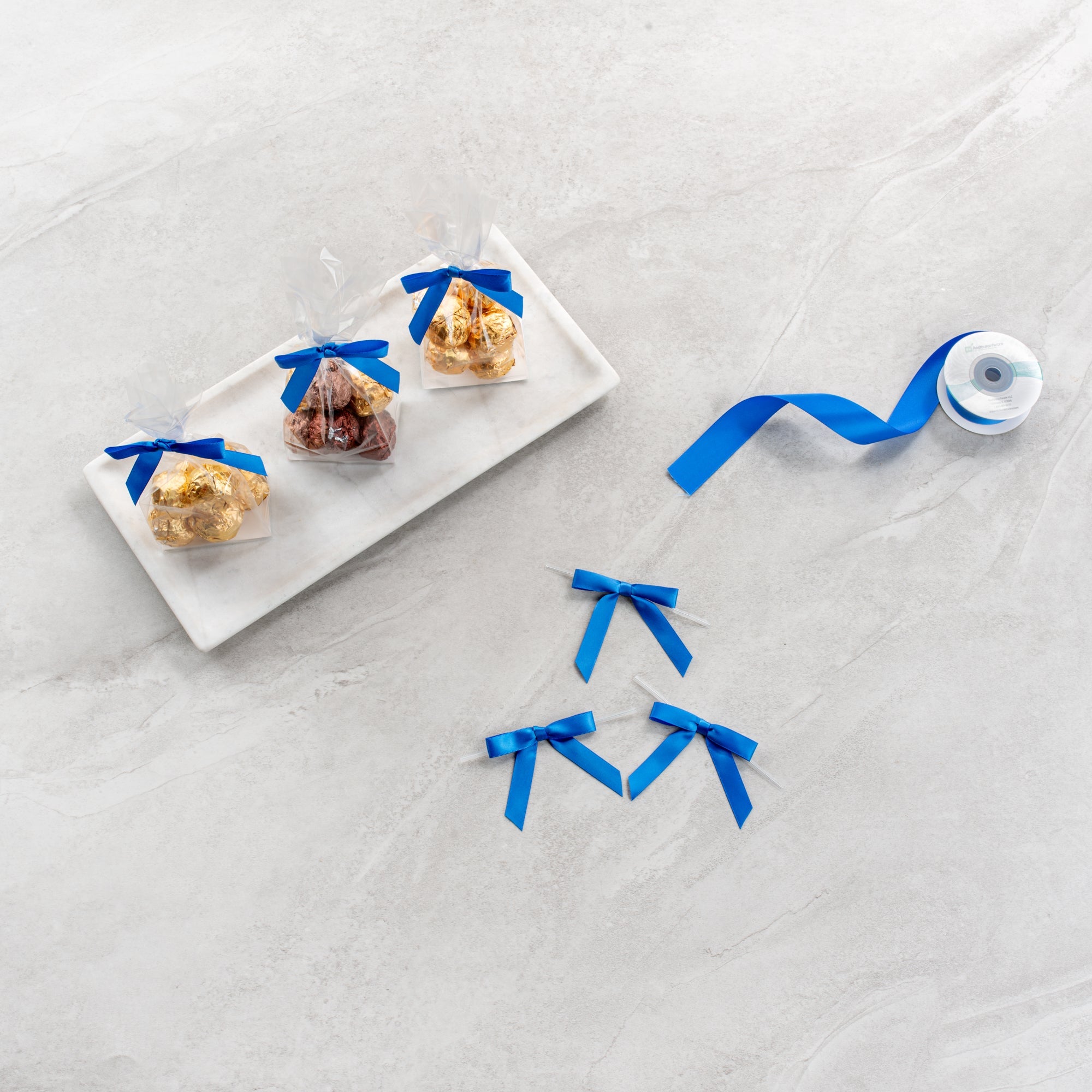 Gift Tek Royal Blue Polyester Satin Twist Tie Bow - Pre-Tied - 3" x 2 1/2" - 4000 count box