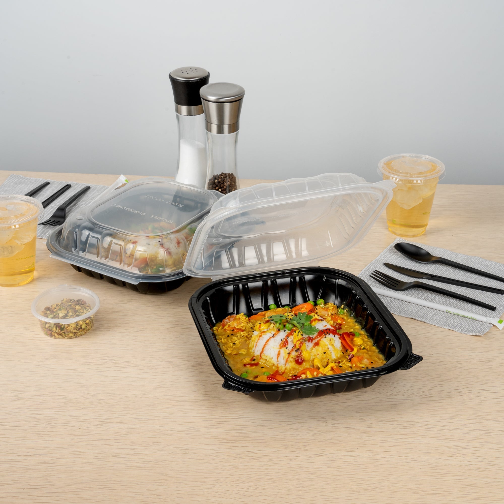 Thermo Tek 54 oz Black Plastic Clamshell Container - Microwavable - 10 1/4" x 9" x 3" - 50 count box