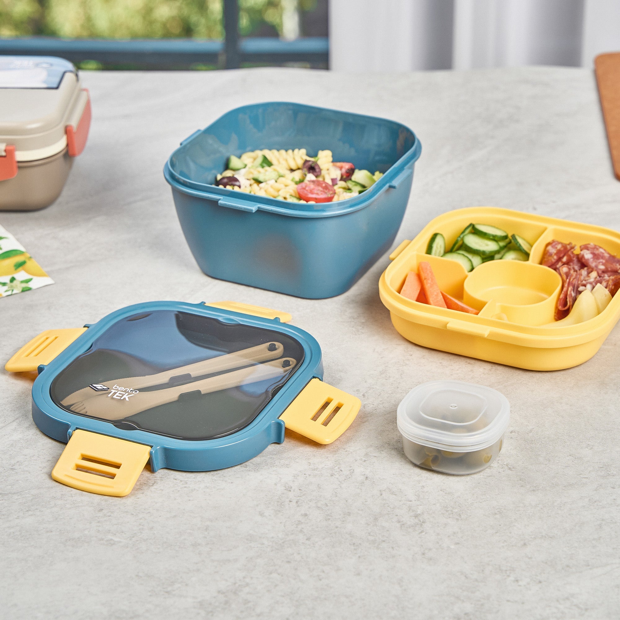 Bento Tek 58 oz Blue and Yellow Lunch Box - BPA-Free, Microwave-Safe, with Fork and Knife - 7 1/4" x 7 1/4" x 4 1/4" - 1 count box