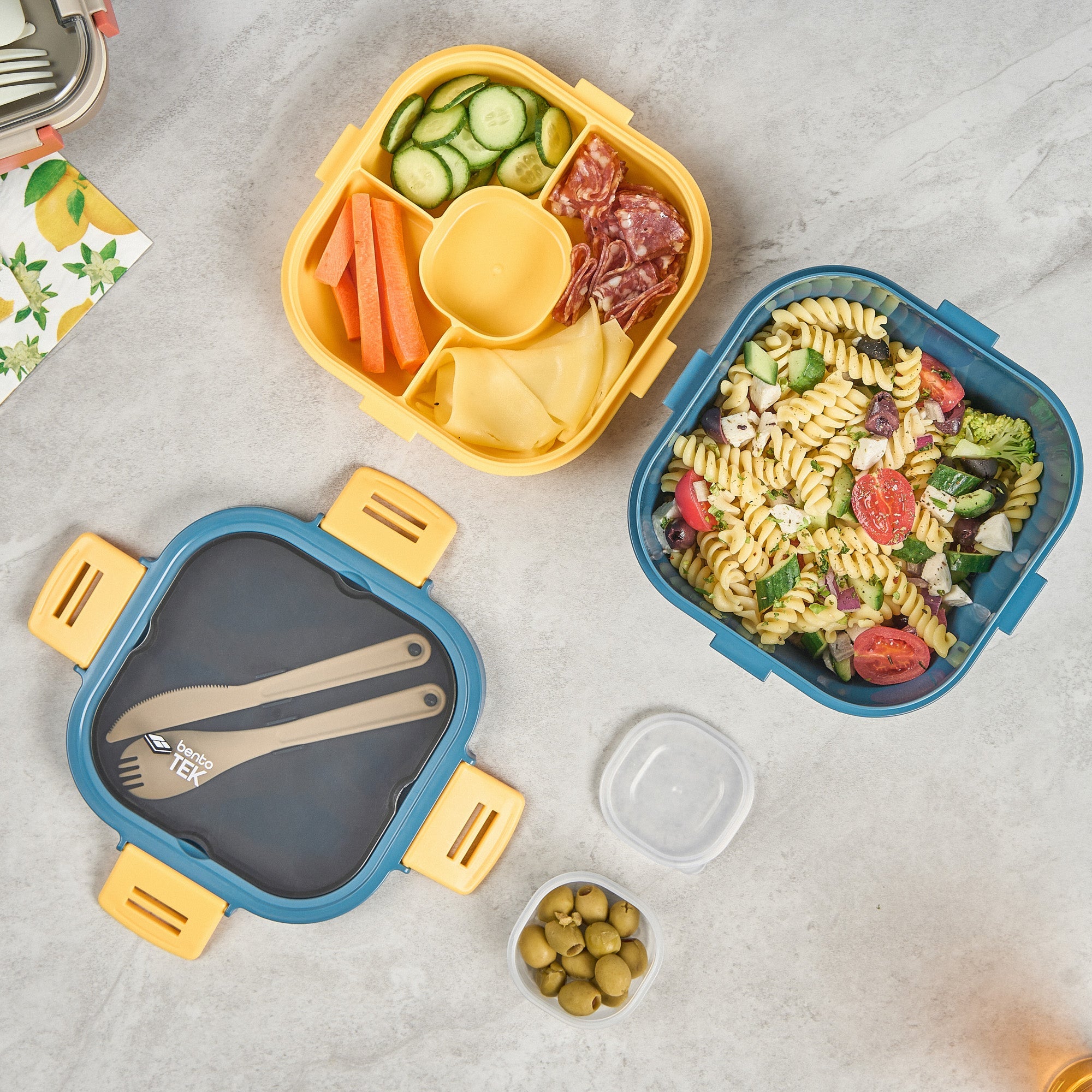 Bento Tek 58 oz Blue and Yellow Lunch Box - BPA-Free, Microwave-Safe, with Fork and Knife - 7 1/4" x 7 1/4" x 4 1/4" - 1 count box