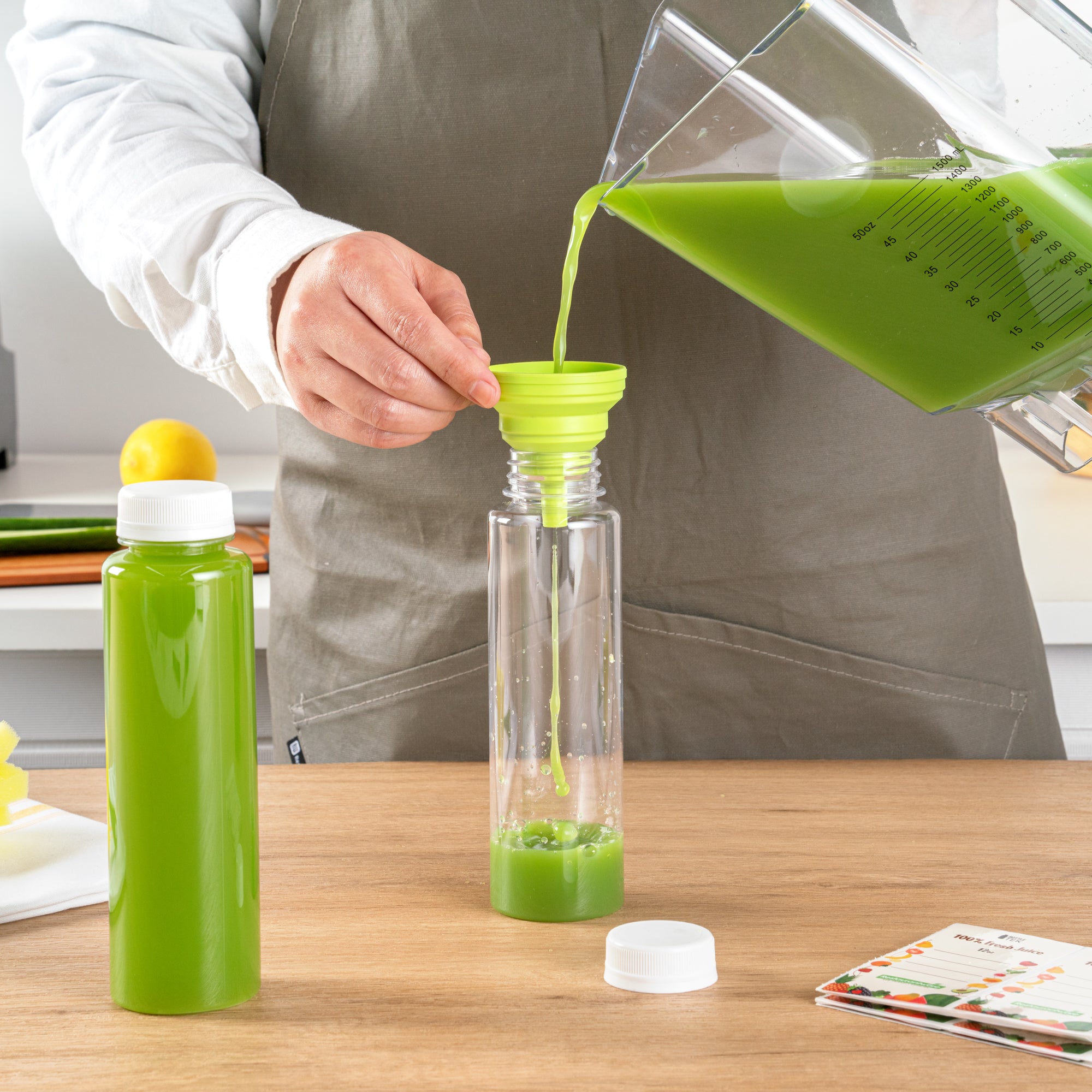 Bottle Tek 100 Round Clear 12 oz Plastic Juice Bottles with Safety Caps - Includes 100 Labels, 10 Funnels and 10 Cleaning Brushes