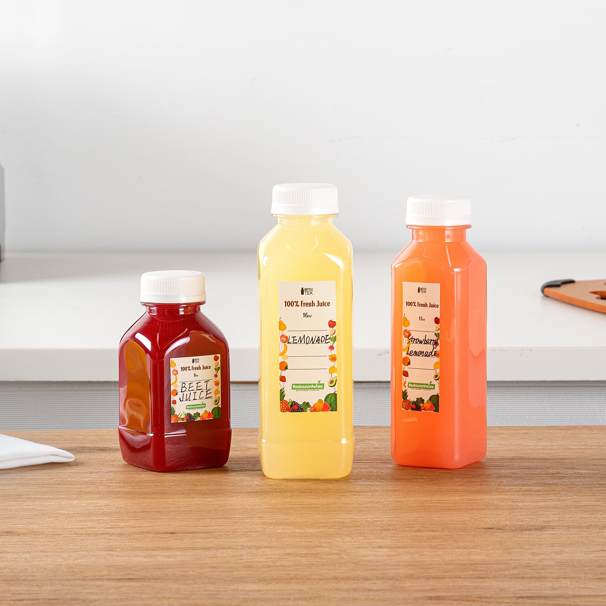 Bottle Tek 10 Square Clear 16 oz Plastic Juice Bottles with Safety Caps - Includes 10 Labels, 1 Funnel and 1 Cleaning Brush
