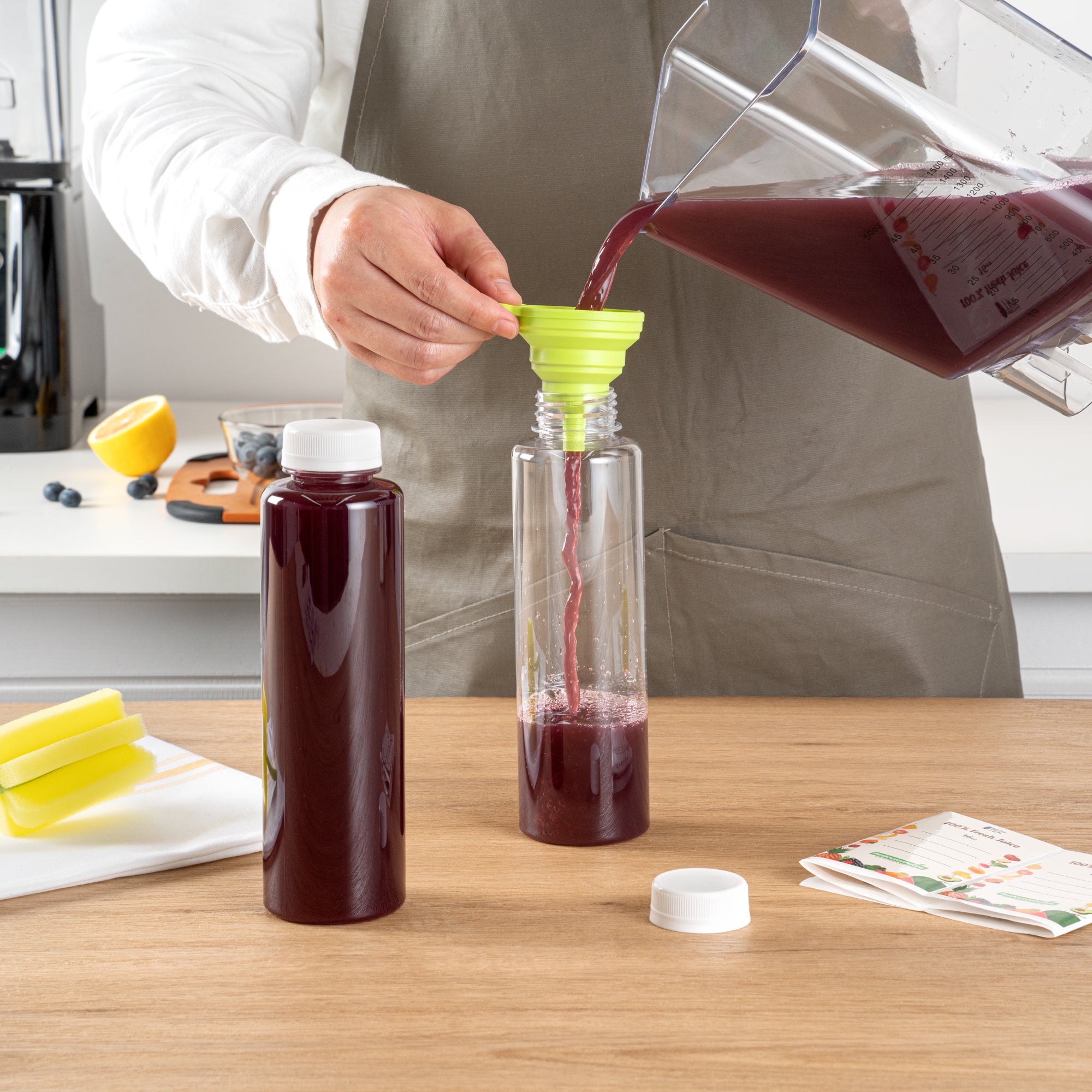 Bottle Tek 100 Round Clear 16 oz Plastic Juice Bottles with Safety Caps - Includes 100 Labels, 10 Funnels and 10 Cleaning Brushes