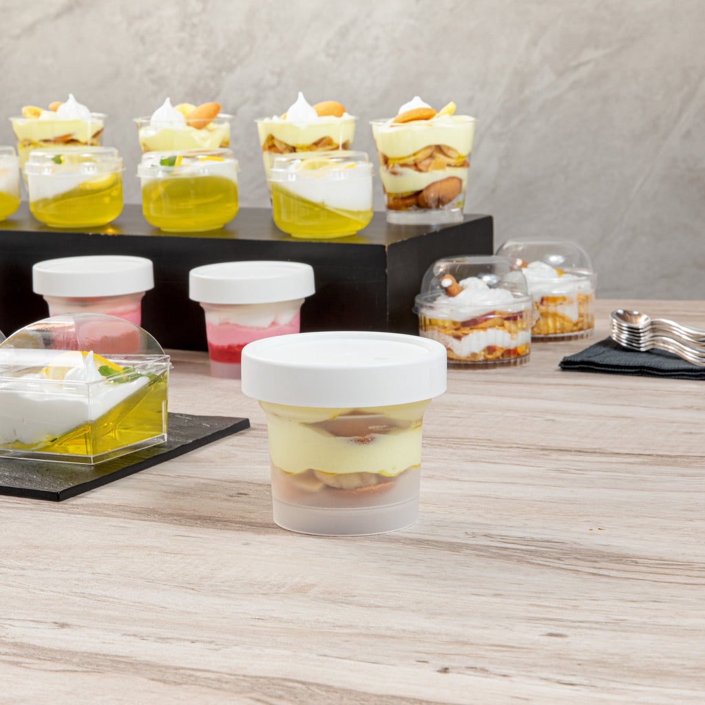 Mini Serve 8 oz Round Clear Plastic Dessert Cup - with Lid - 3 1/2'' x 3 1/2'' x 3'' - 100 count box