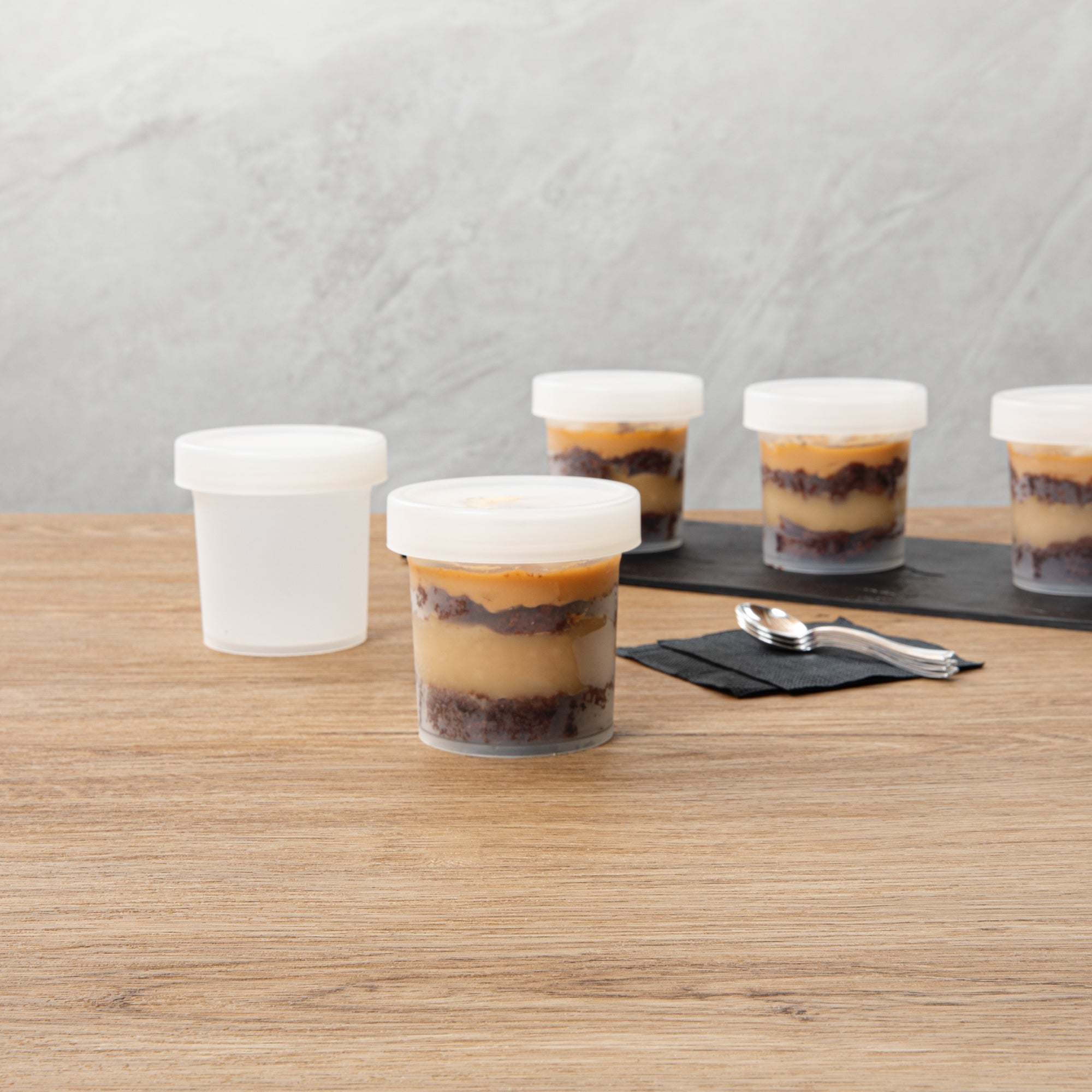 Mini Serve 10 oz Round Clear Plastic Dessert Cup - with Lid - 3 1/2'' x 3 1/2'' x 3 1/2'' - 25 count box