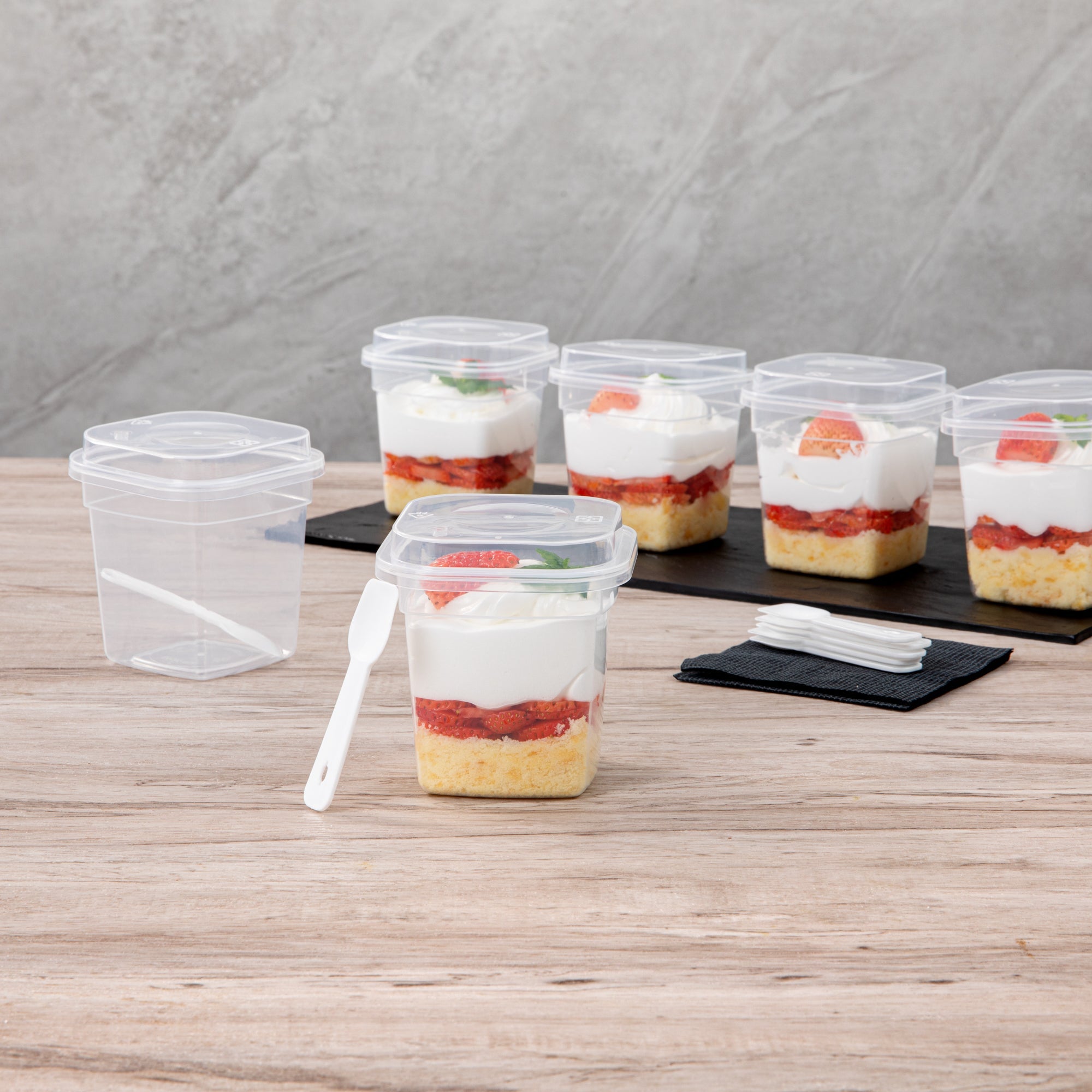 Mini Serve 7 oz Square Clear Plastic Dessert Cup - with Lid and Spoon - 3 1/4'' x 3 1/4'' x 3 1/2'' - 100 count box