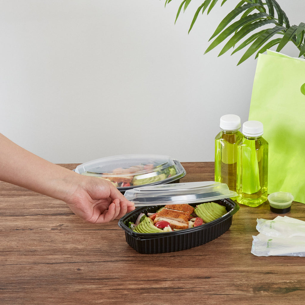 Chef 101 28 oz Oval Black Plastic Food Container - with Clear Lid, Microwavable - 9 1/4" x 5 3/4" x 2 3/4" - 100 count box