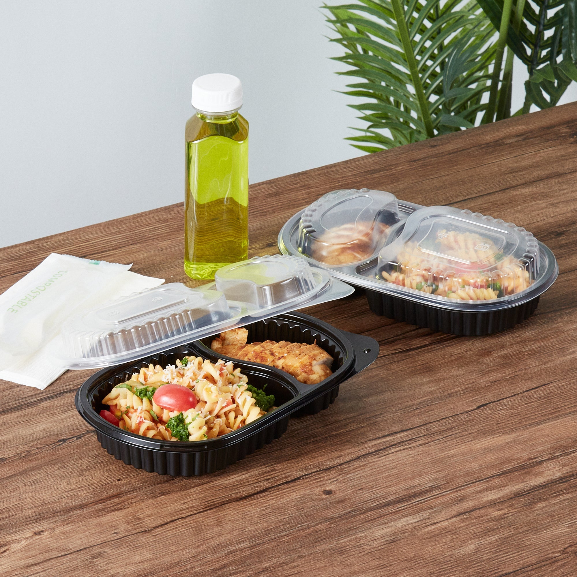 Chef 101 20 oz Oval Black Plastic Food Container - with Clear Dome Lid, Microwavable - 9 1/4" x 6" x 2 1/4" - 50 count box