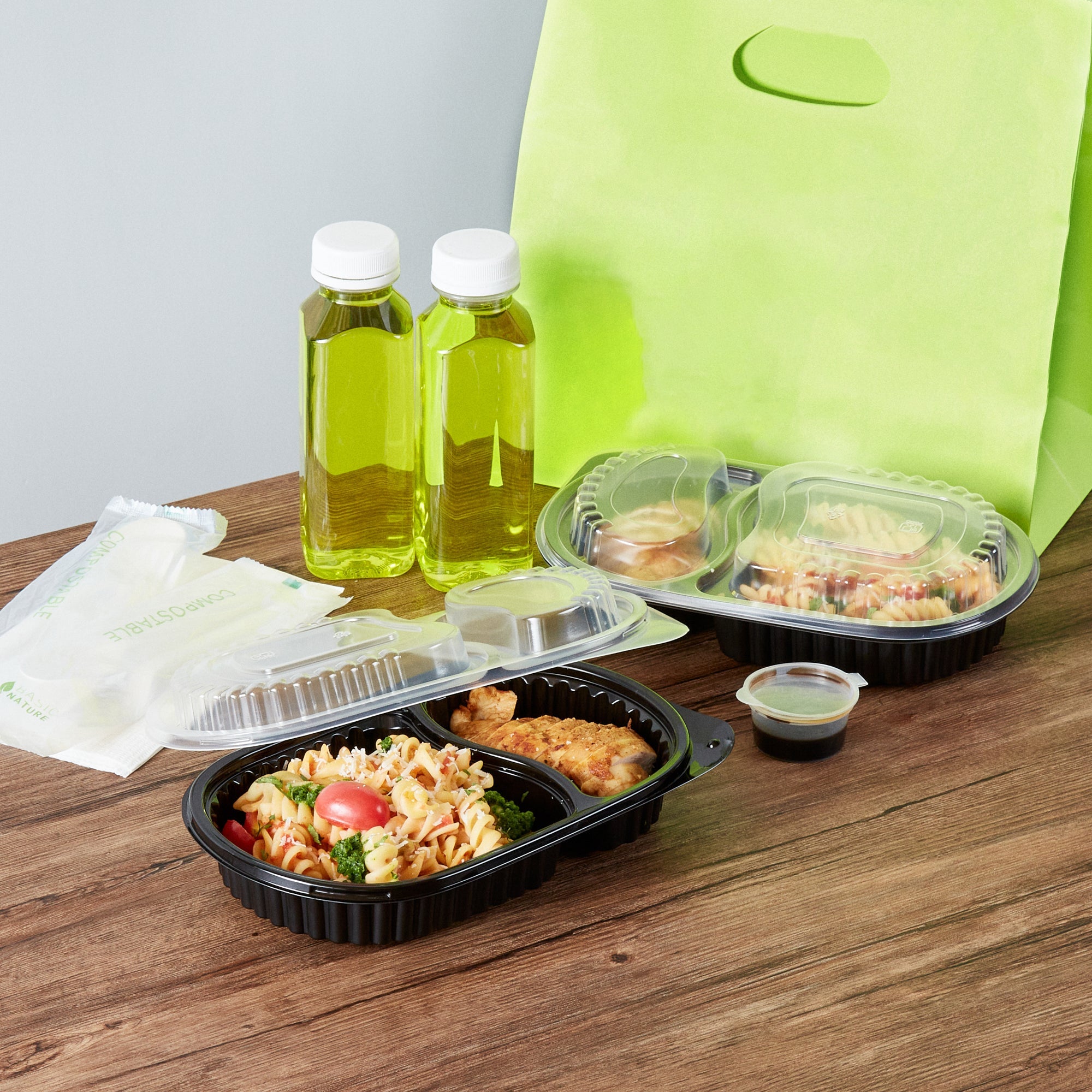 Chef 101 20 oz Oval Black Plastic Food Container - with Clear Dome Lid, Microwavable - 9 1/4" x 6" x 2 1/4" - 100 count box