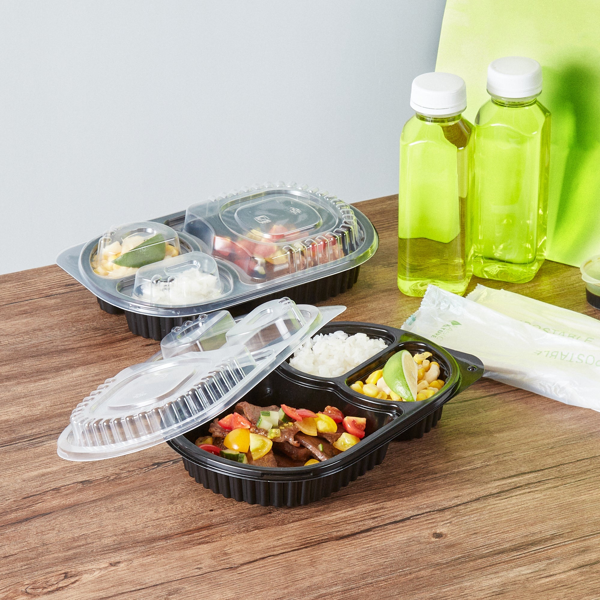 Chef 101 19 oz Oval Black Plastic Food Container - with Clear Lid, 3 Compartments, Microwavable - 9 1/4" x 6" x 2 1/4" - 100 count box