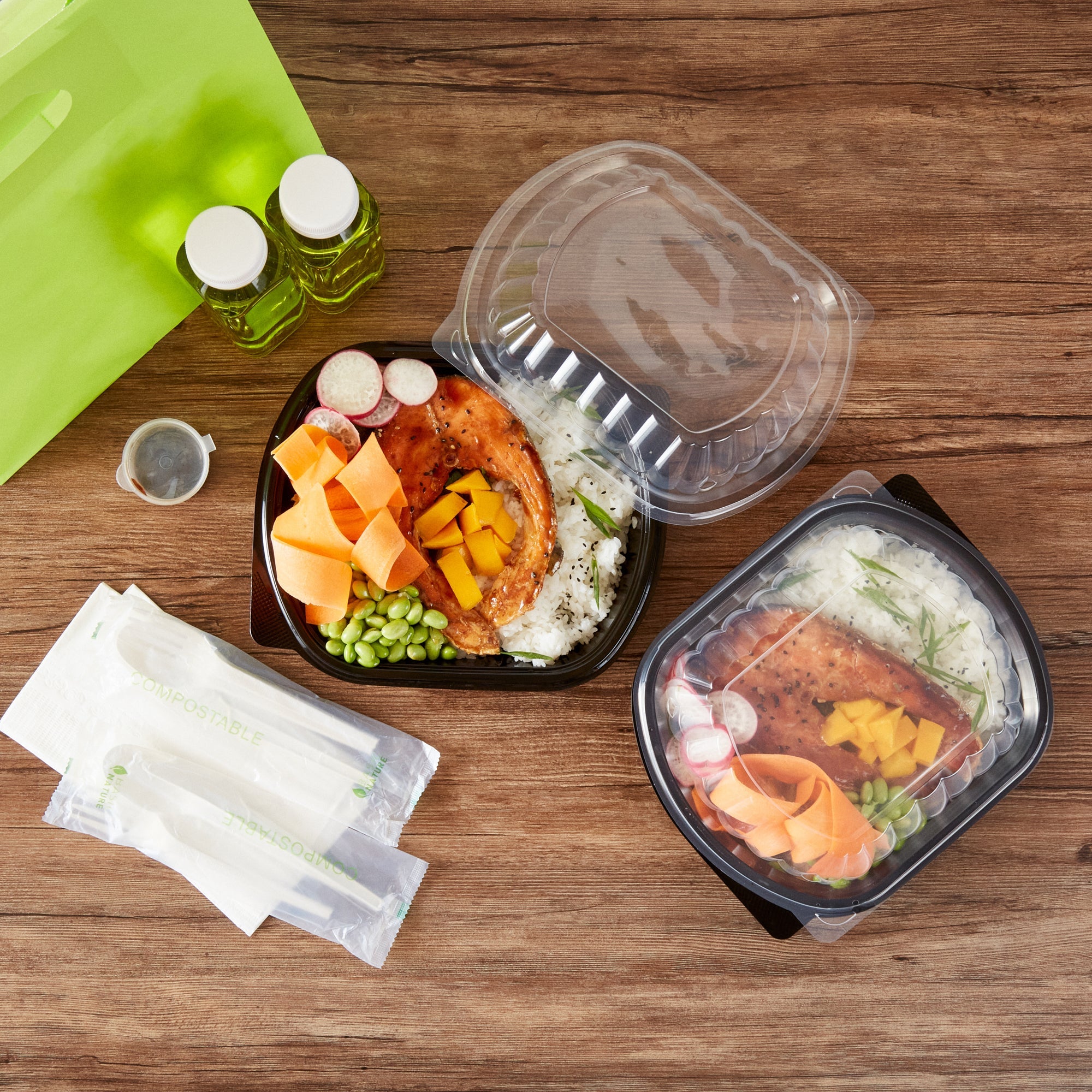 Chef 101 34 oz Oval Black Plastic Food Container - with Clear Lid, Microwavable - 9 1/2" x 8" x 2 3/4" - 50 count box