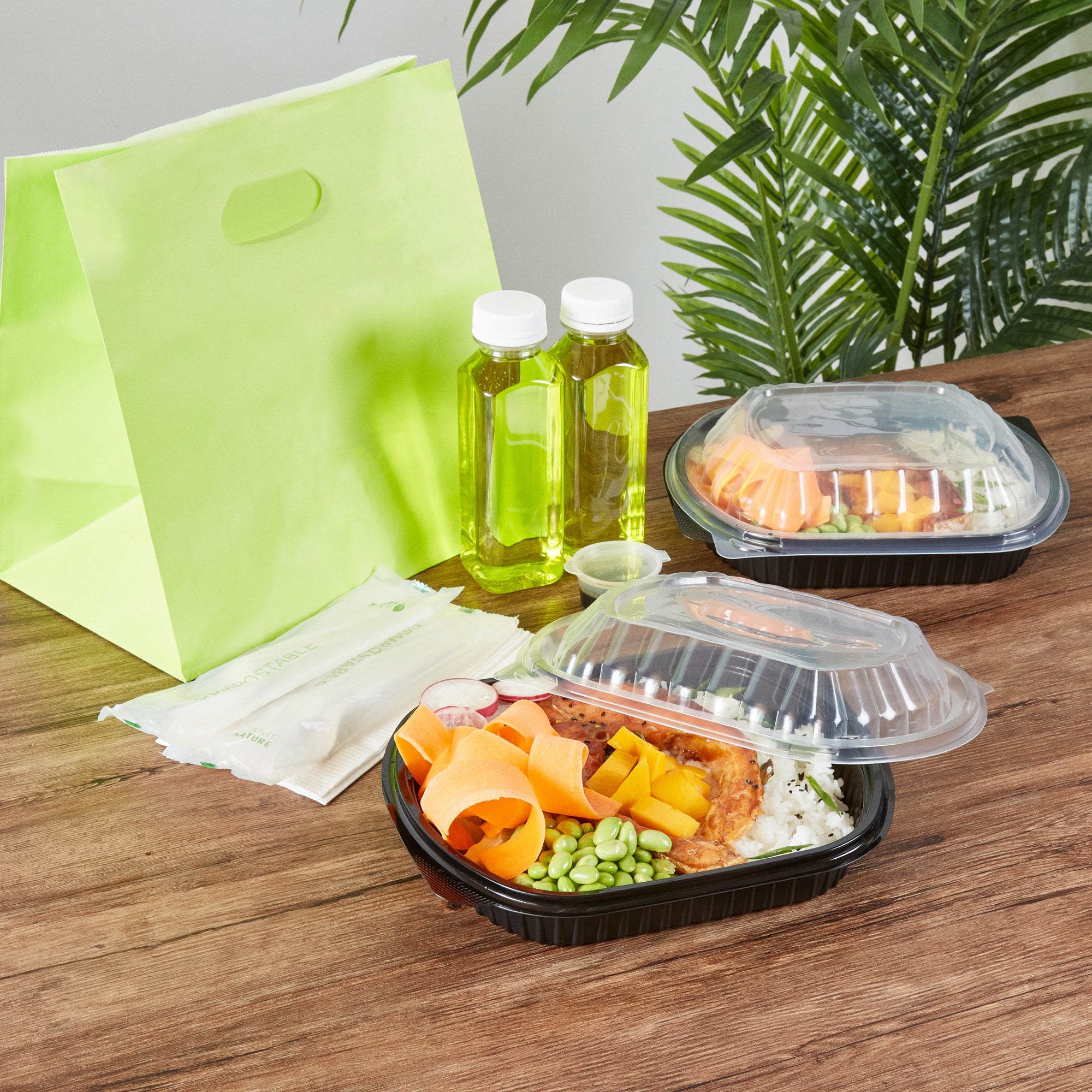 Chef 101 34 oz Oval Black Plastic Food Container - with Clear Lid, Microwavable - 9 1/2" x 8" x 2 3/4" - 100 count box