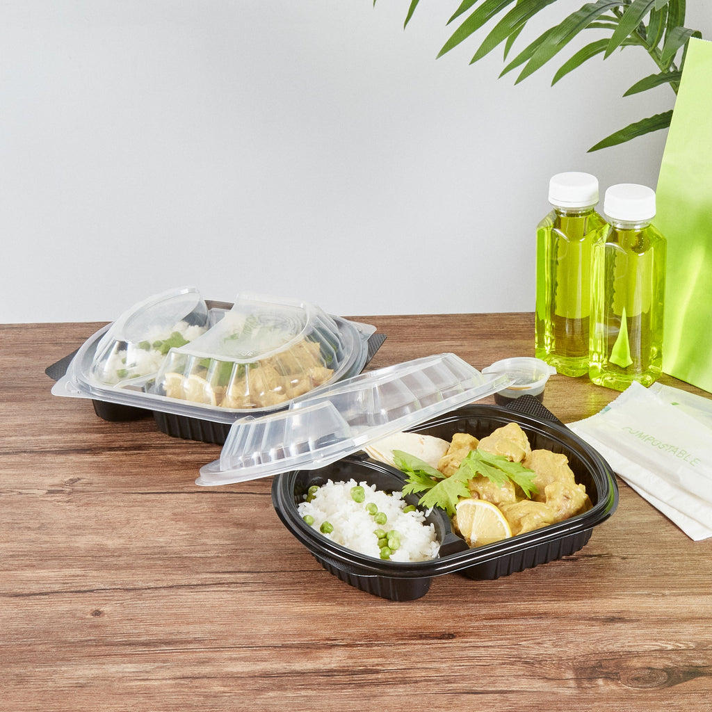 Chef 101 28 oz Oval Black Plastic Food Container - with Clear Lid, 2 Compartments, Microwavable - 9 1/2" x 8" x 2 3/4" - 100 count box