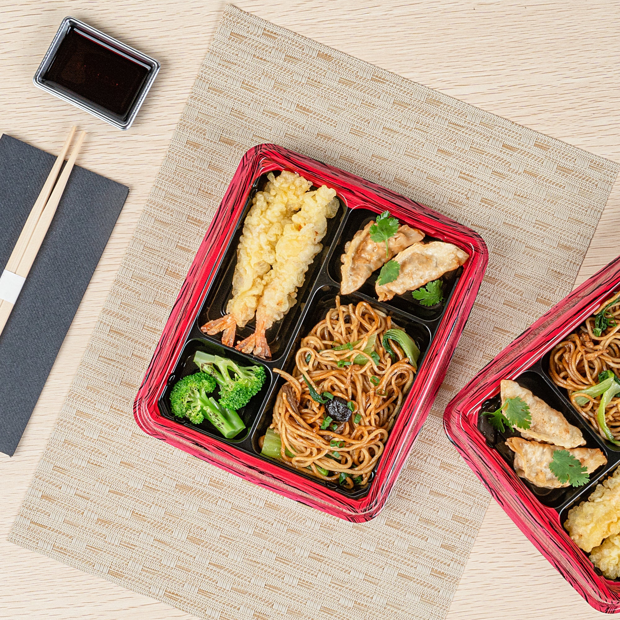 Bento Tek 15 oz Rectangle Red and Black Plastic Bento Box - 4 Compartments - 8 3/4'' x 7 1/2'' x 1 1/2'' - 50 count box