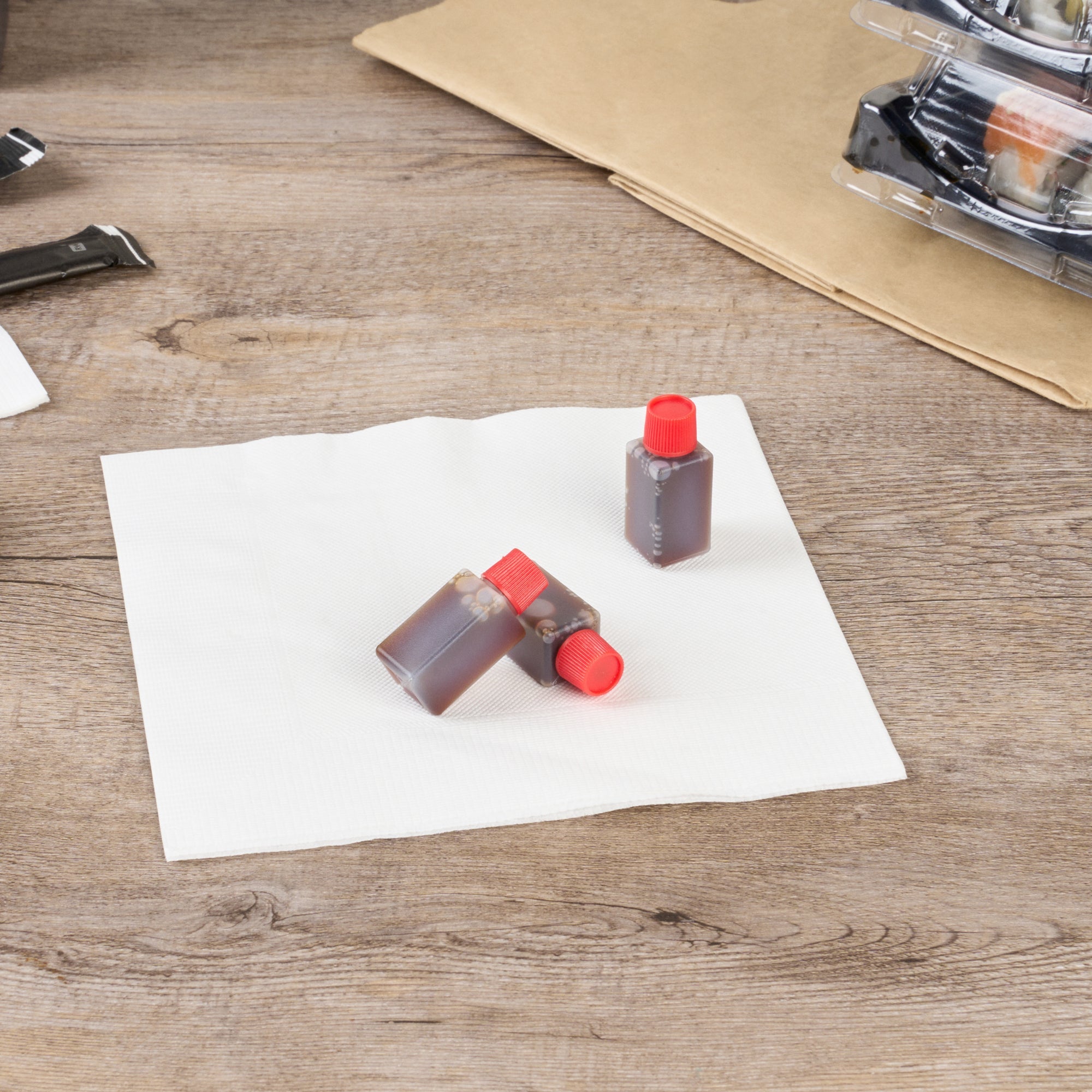 Bento Tek 6 mL Translucent Plastic Soy Sauce Bottle - with Red Cap - 1/2" x 1/2" x 1 3/4" - 100 count box