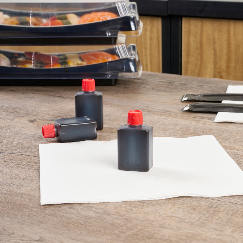 Bento Tek 15 mL Translucent Plastic Soy Sauce Bottle - with Red Cap - 1" x 3/4" x 2" - 100 count box