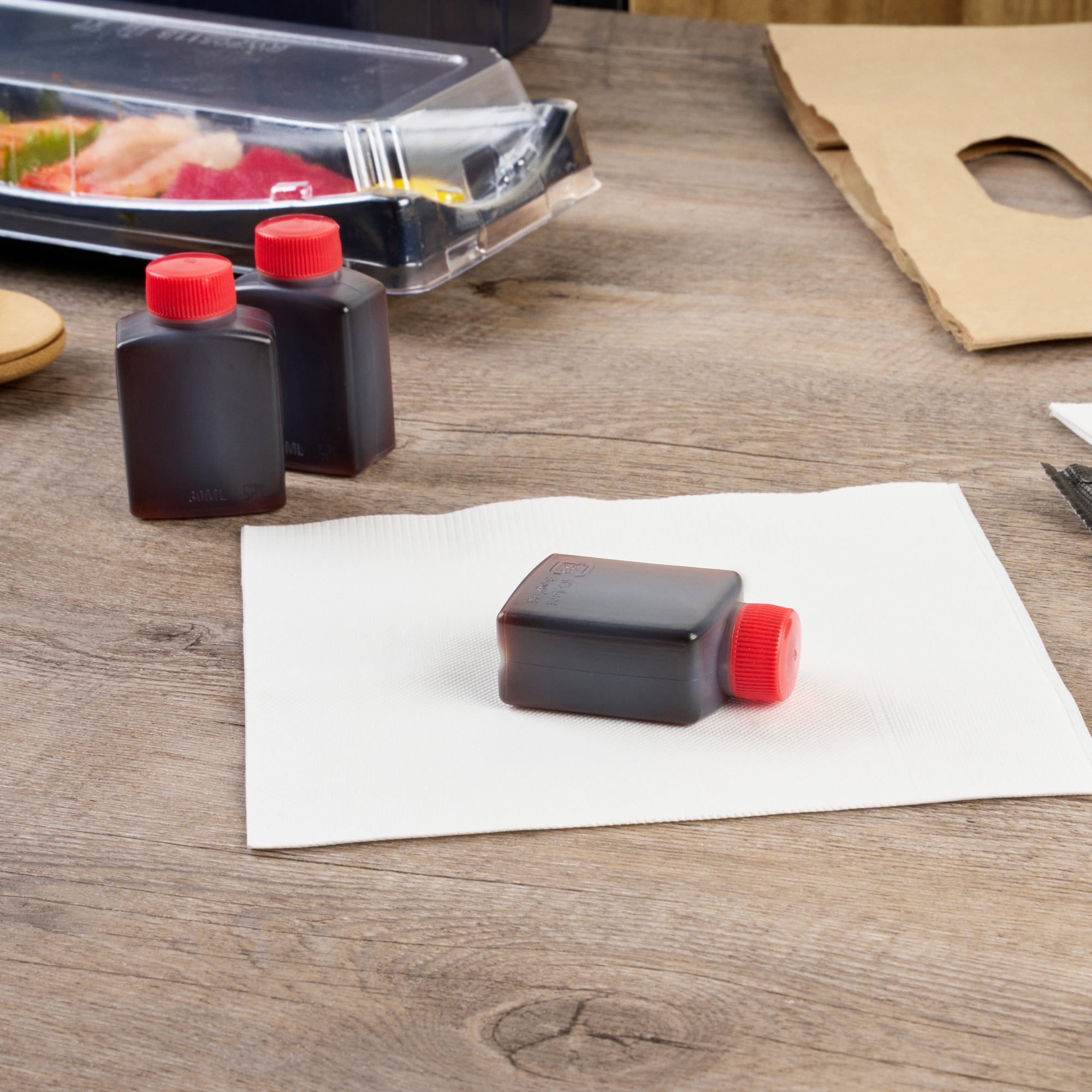 Bento Tek 1 oz Translucent Plastic Soy Sauce Bottle - with Red Cap - 1 1/2" x 3/4" x 2 1/4" - 100 count box