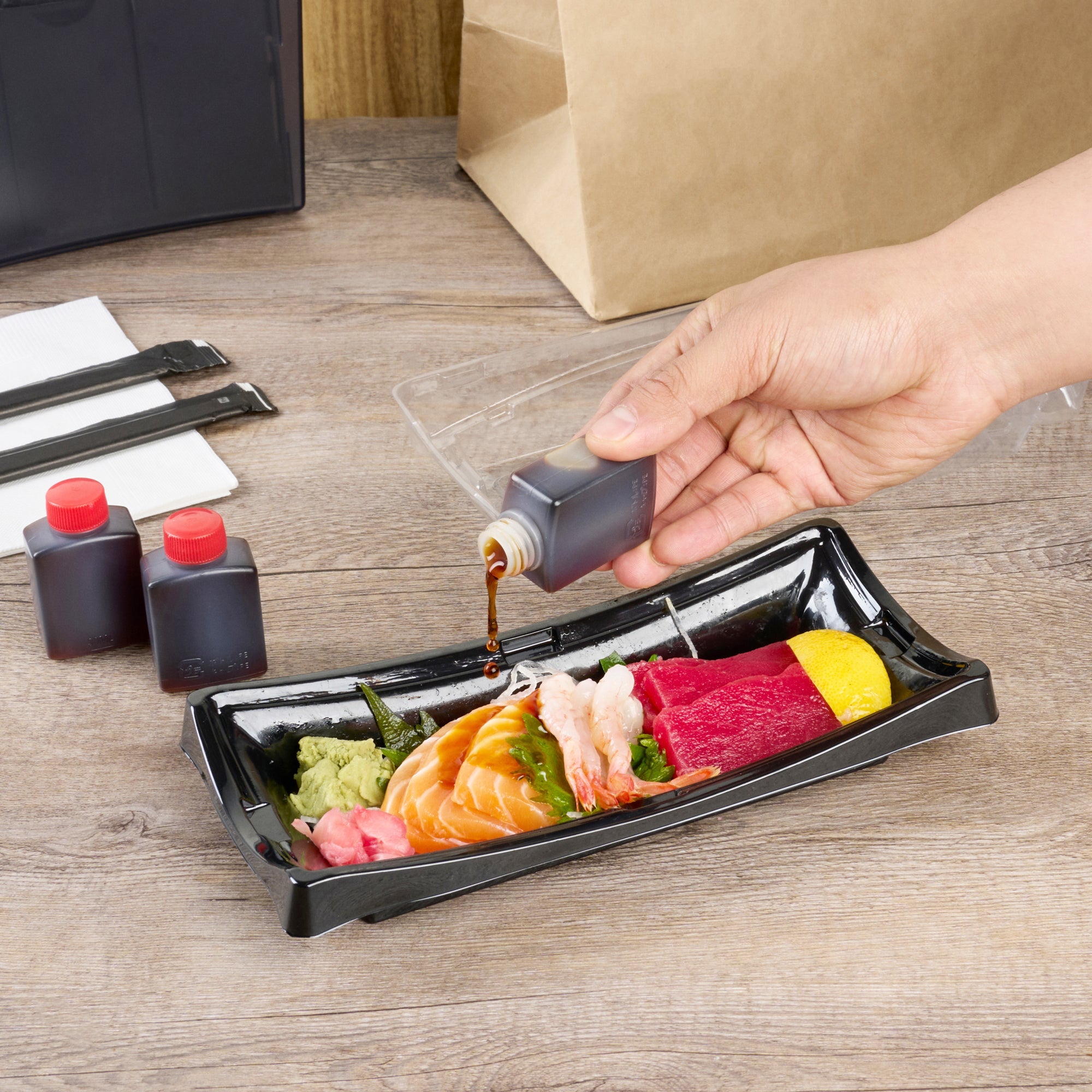 Bento Tek 1 oz Translucent Plastic Soy Sauce Bottle - with Red Cap - 1 1/2" x 3/4" x 2 1/4" - 100 count box