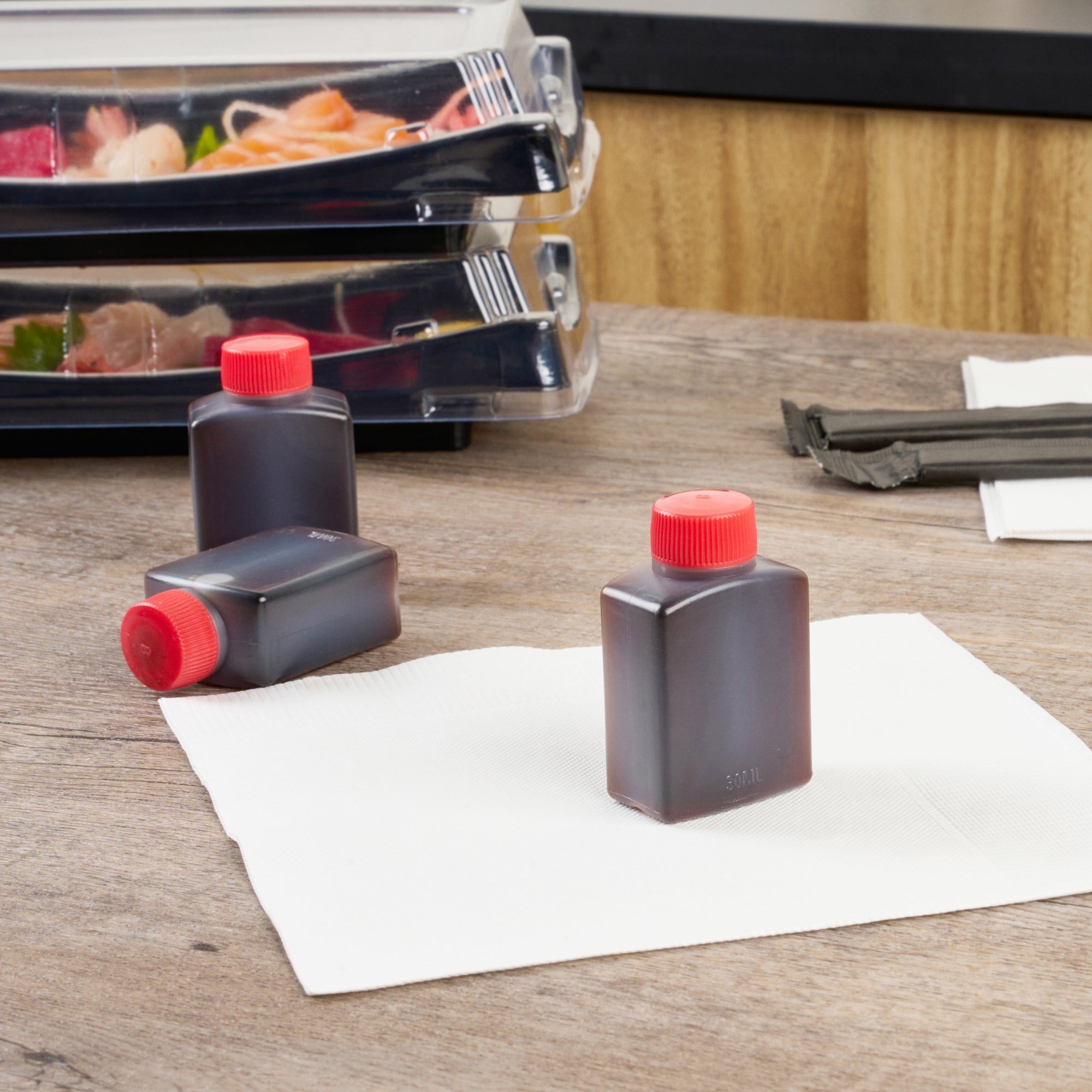 Bento Tek 1 oz Translucent Plastic Soy Sauce Bottle - with Red Cap - 1 1/2" x 3/4" x 2 1/4" - 100 count box