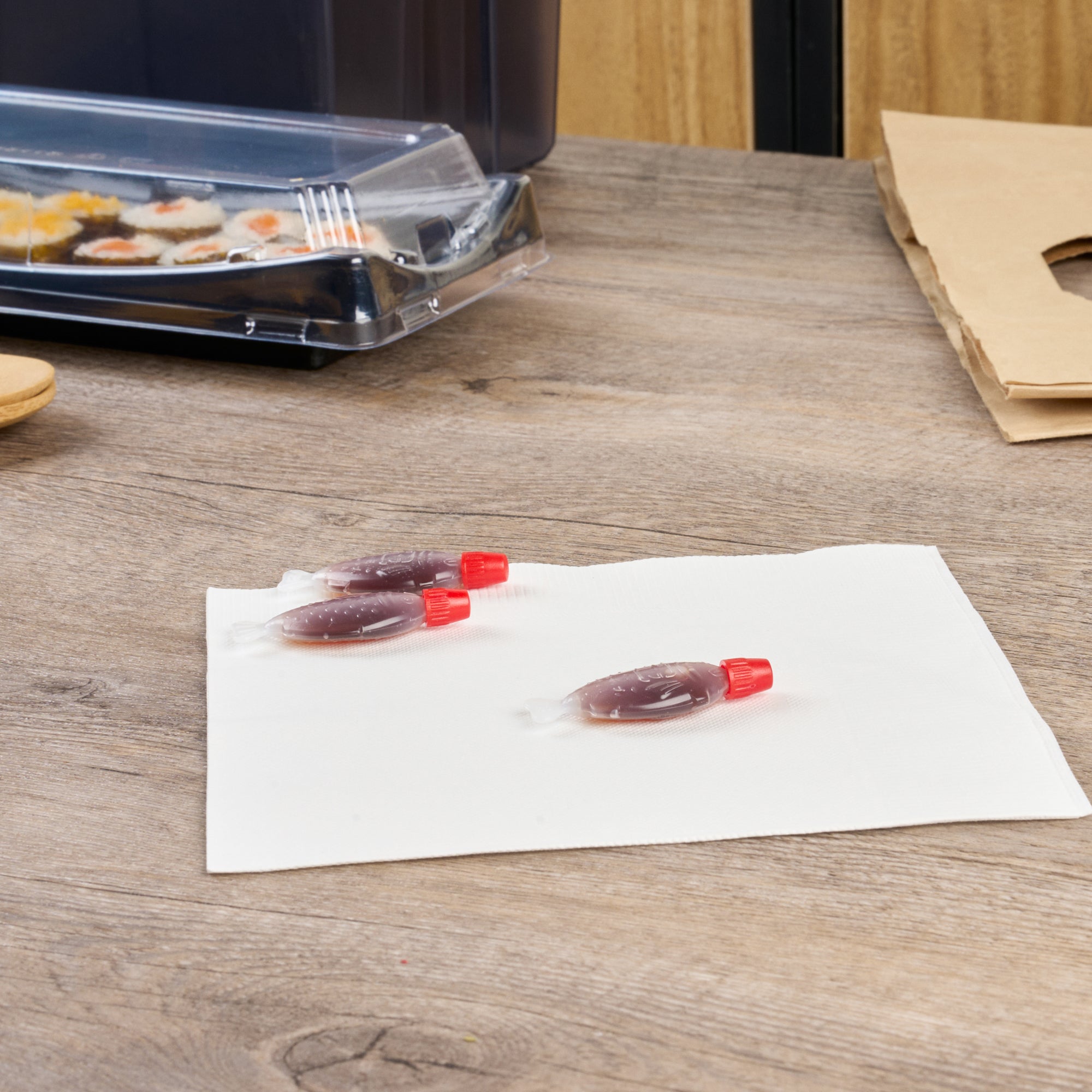 Bento Tek 3 mL Translucent Plastic Fish Soy Sauce Bottle - with Red Cap - 2 1/4" x 1/2" x 1" - 1000 count box
