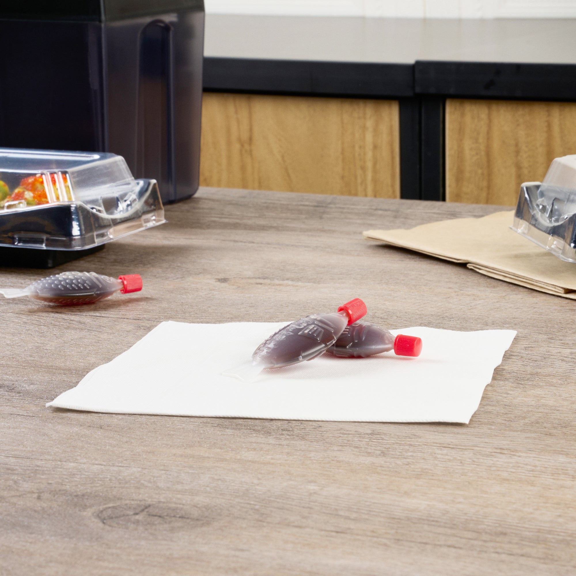 Bento Tek 8 mL Translucent Plastic Fish Soy Sauce Bottle - with Red Cap - 3" x 1/2" x 1 1/4" - 100 count box
