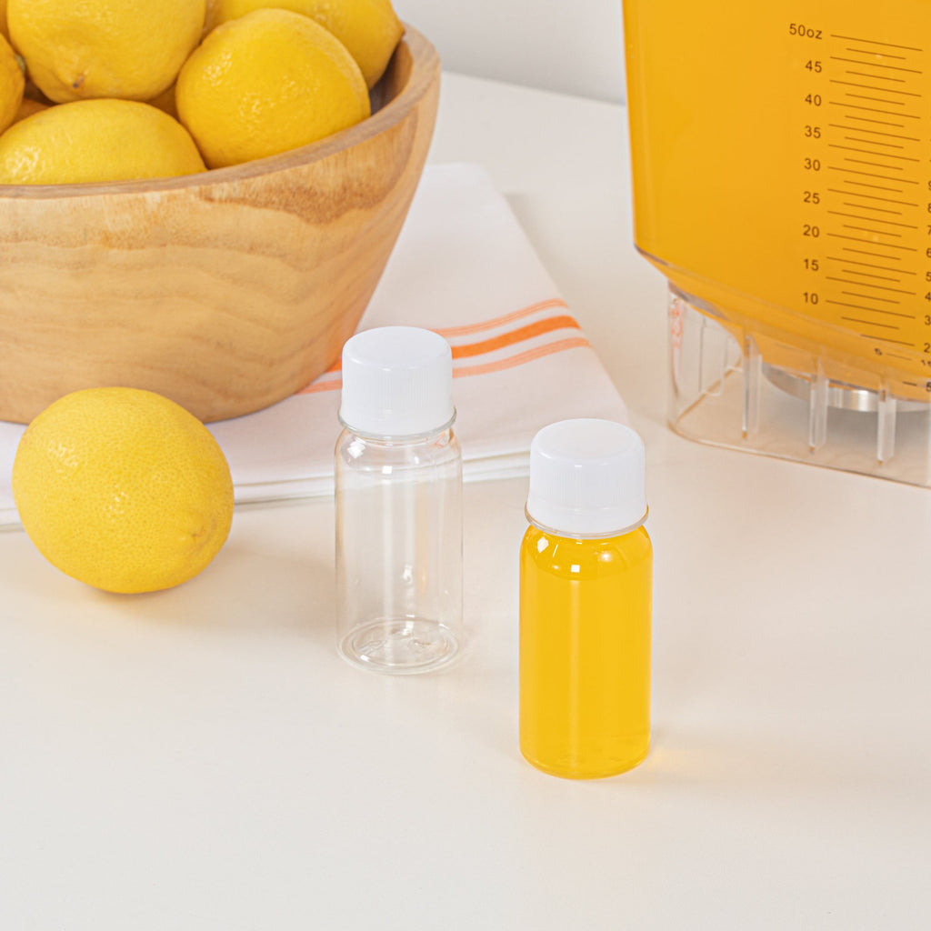 Bottle Tek 2 oz Clear Plastic Energy Shot Bottle - with Safety Cap - 1 1/2" x 1 1/2" x 3 3/4" - 100 count box