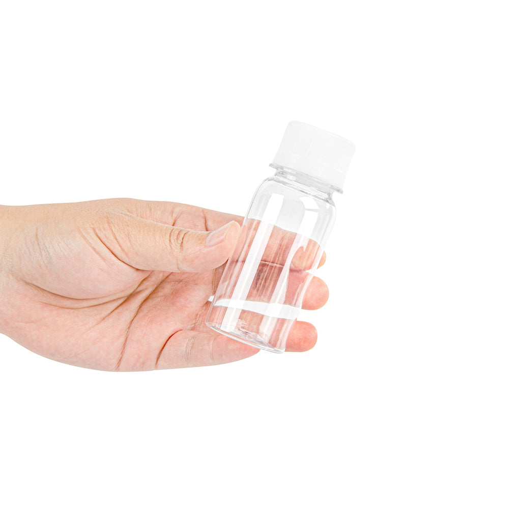 Bottle Tek 2 oz Clear Plastic Energy Shot Bottle - with Safety Cap - 1 1/2" x 1 1/2" x 3 3/4" - 100 count box