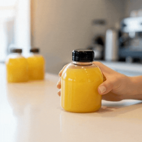 Bottle Tek 14 oz Round Clear PET Juice Bottle - with Cap - 3" x 3" x 4 1/2" - 100 count box