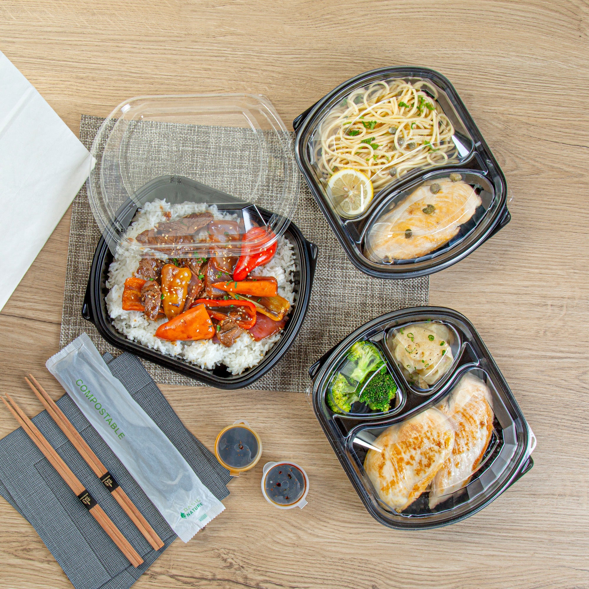 Chef 101 36 oz Rectangle Black Plastic Food Container - with Clear Lid, Microwavable - 9 1/4" x 7 3/4" x 2 3/4" - 50 count box