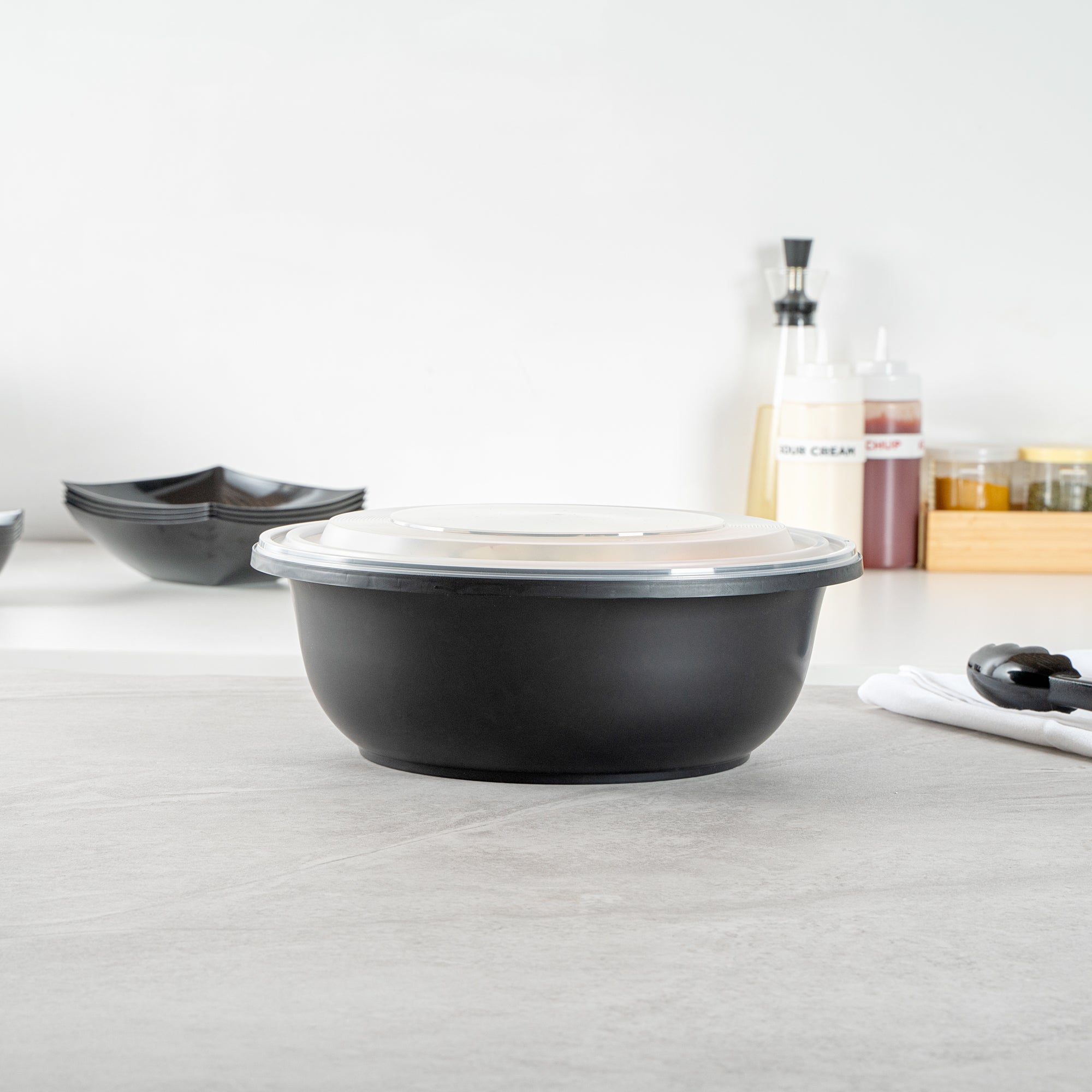 Cater Tek 169 oz Round Black Catering / Serving Bowl - with Clear Lid, Microwavable - 11 3/4" x 11 3/4" x 4 1/2" - 50 count box