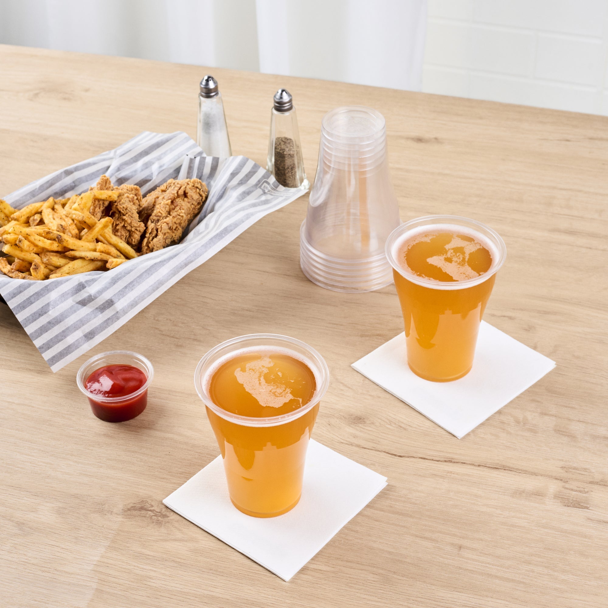 Basic Nature 14 oz Clear PLA Plastic Beer Glass - Compostable - 3 3/4" x 3 3/4" x 4 1/2" - 1000 count box