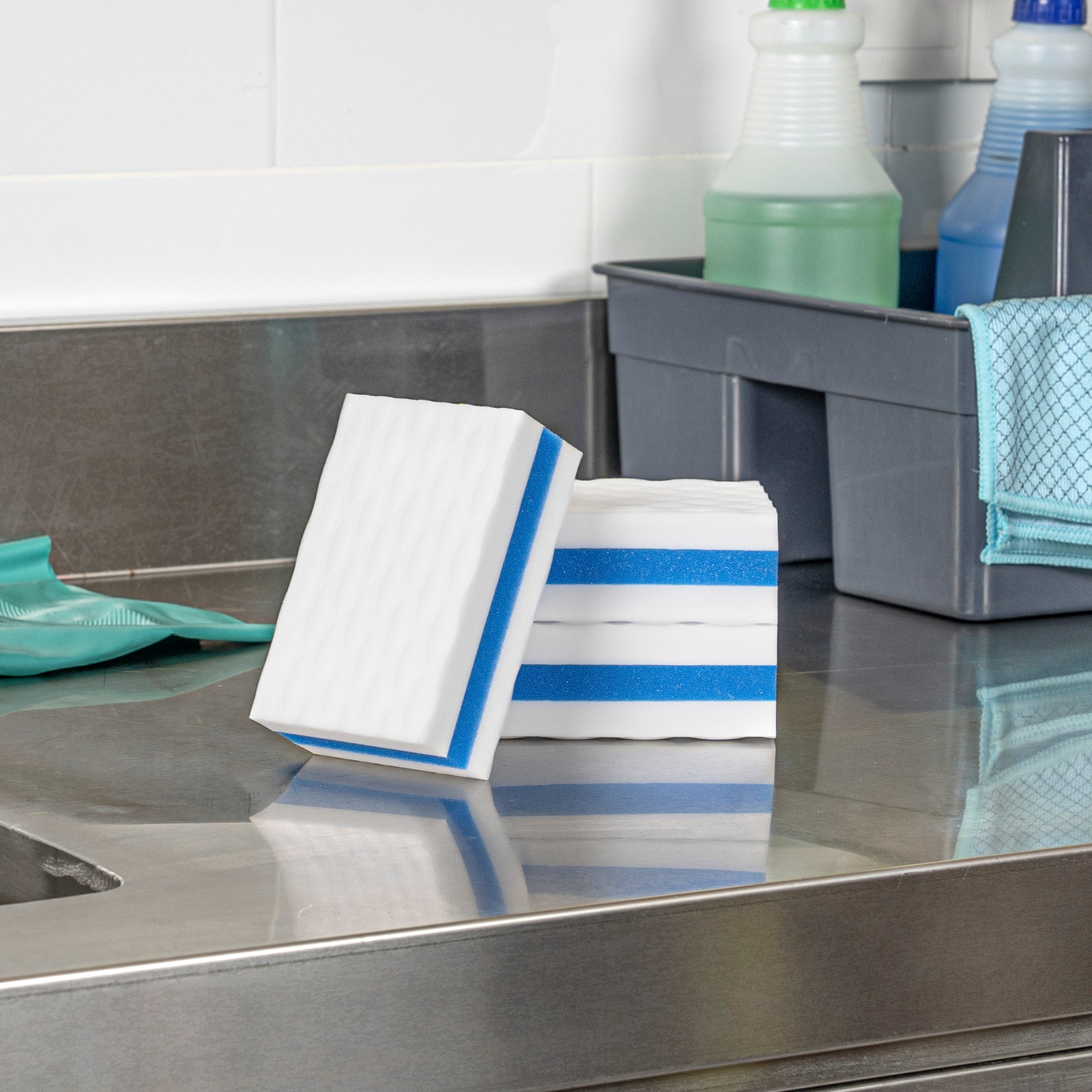 Clean Tek Professional White and Blue Triple Layer Melamine Eraser Sponge - 4 1/4" x 2 3/4" x 1 1/2" - 60 count box