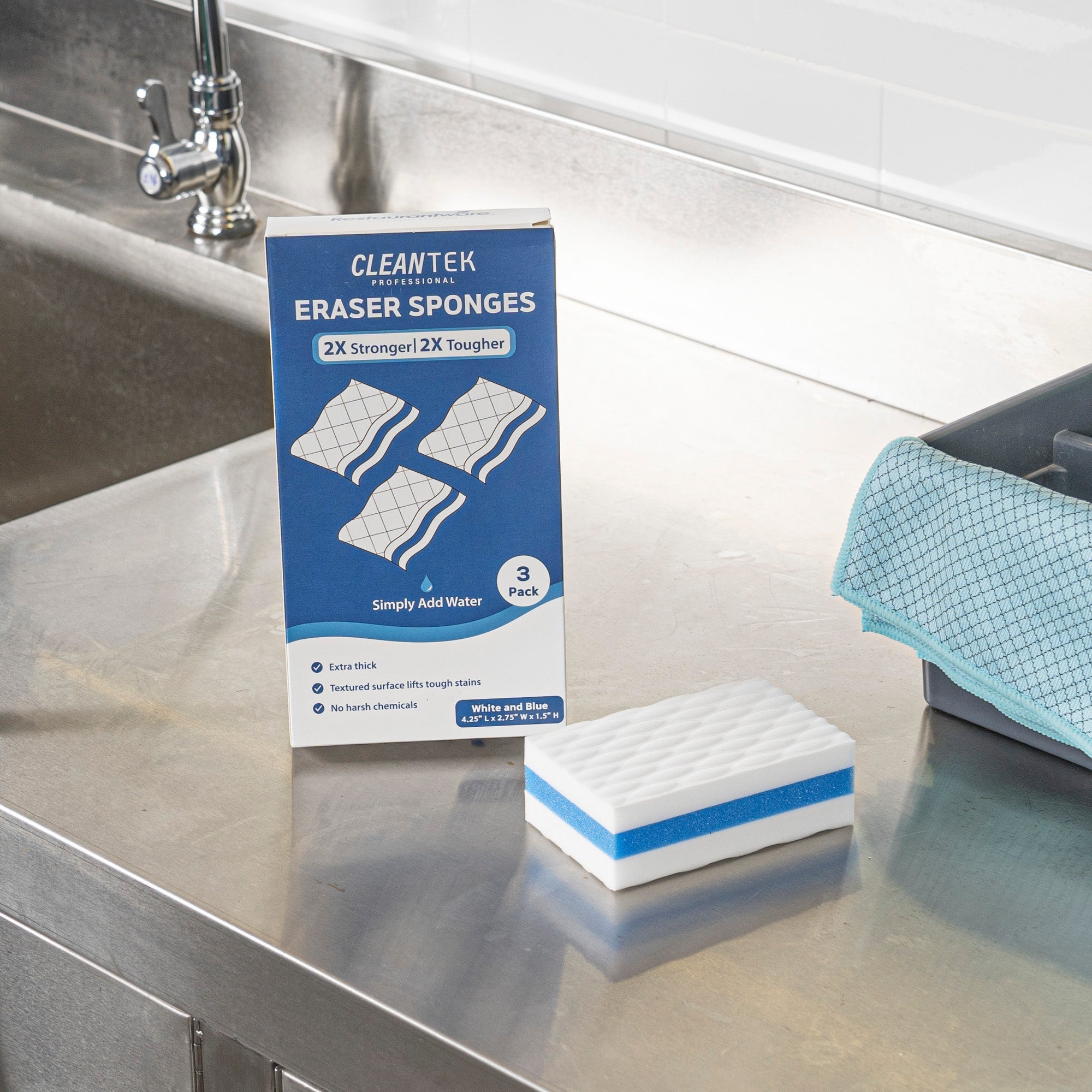 Clean Tek Professional White and Blue Triple Layer Melamine Eraser Sponge - 4 1/4" x 2 3/4" x 1 1/2" - 60 count box