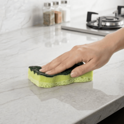 Clean Tek Professional Heavy-Duty Light and Dark Green Cellulose Scouring Sponge - Grooved - 4 1/2" x 2 1/2" x 1" - 60 count box