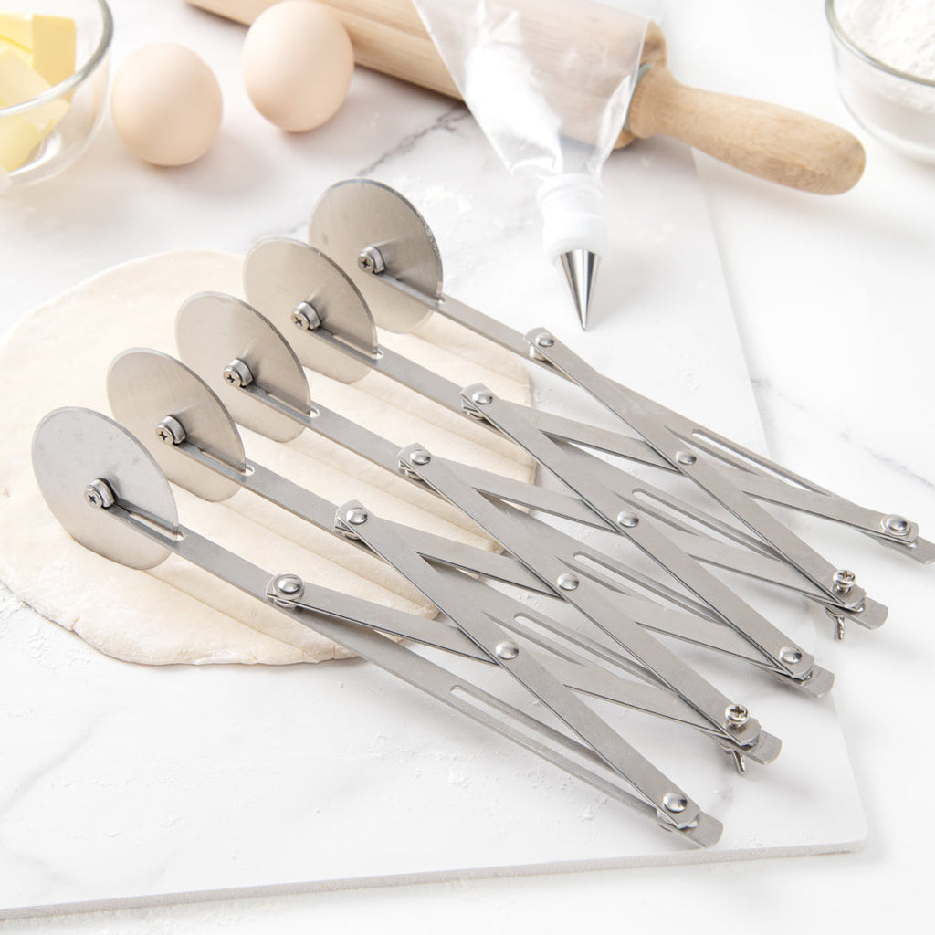 Met Lux Stainless Steel 5-Wheel Pastry Cutter - 2 1/4" Blades - 9 1/2" x 9 1/2" x 2 1/4" - 1 count box
