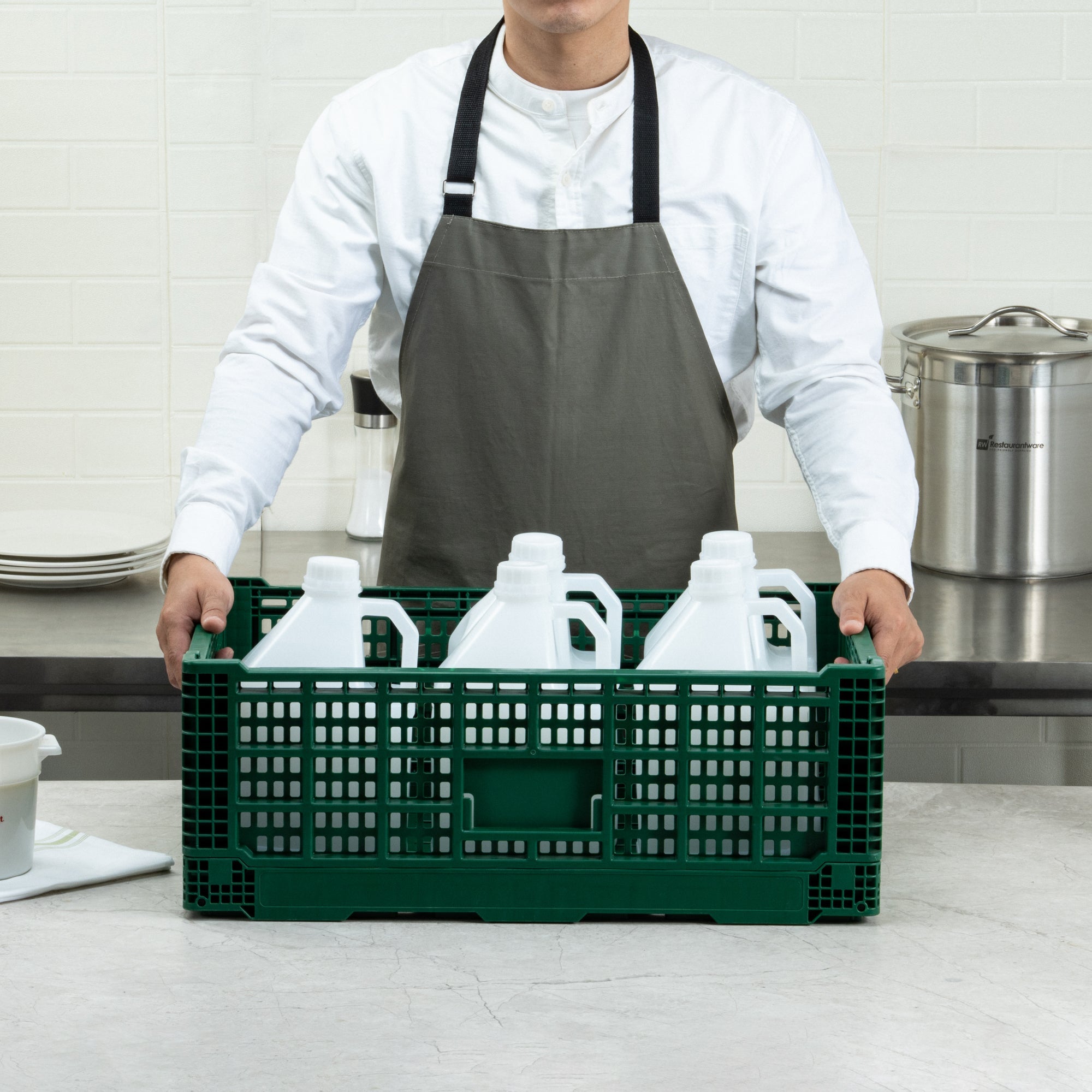 Cater Tek Rectangle Green Plastic 36L Collapsible Milk Crate - Stackable - 23 1/2" x 15 3/4" x 8 1/2" - 1 count box