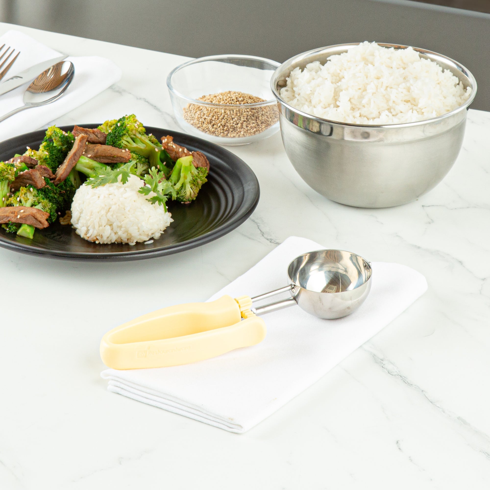 Comfy Grip 3 oz Stainless Steel #10 Portion Scoop - with Ivory Ambidextrous Handle - 1 count box