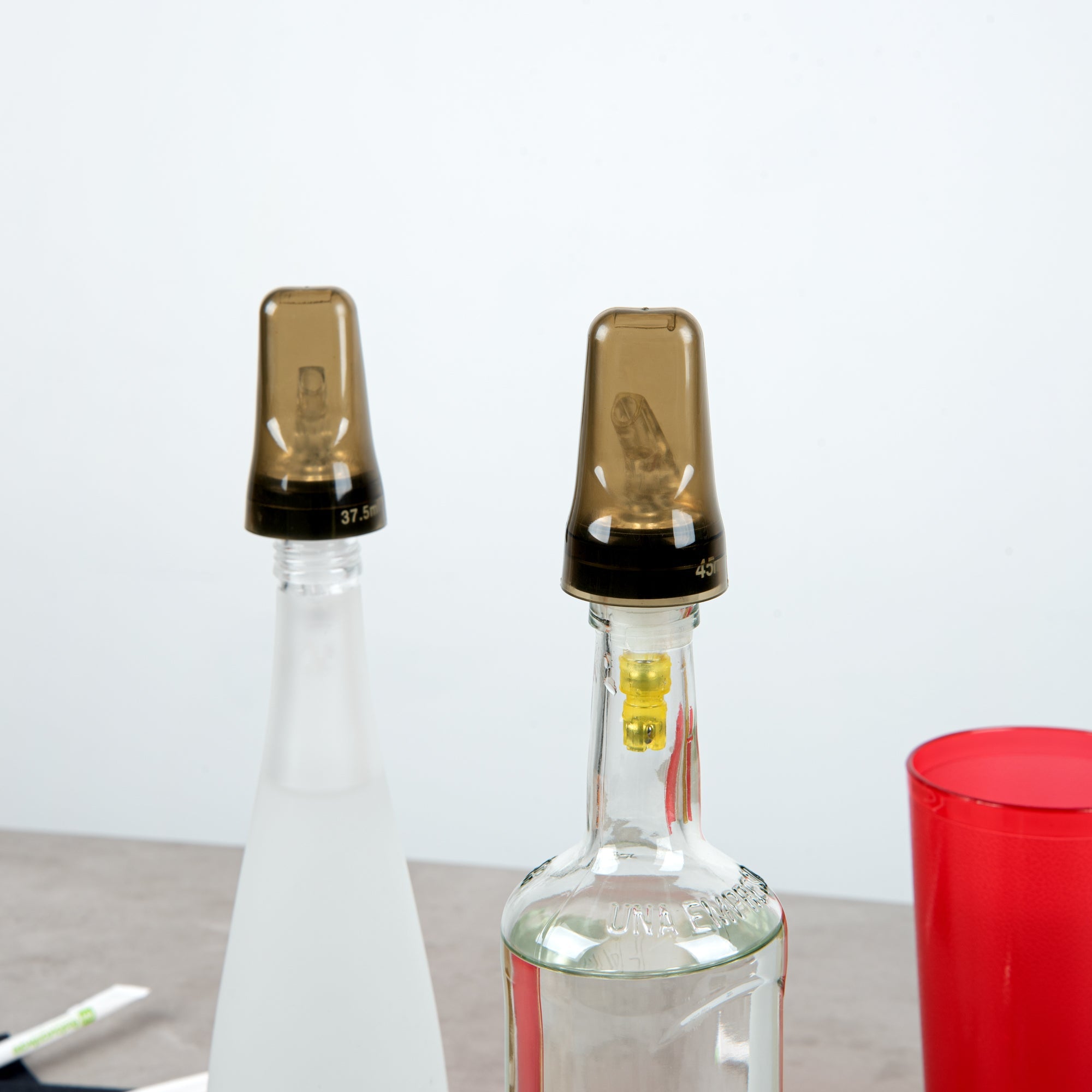 Bar Lux Translucent Plastic Liquor Pourer Cover - Universal - 1 3/4" x 1 3/4" x 3" - 10 count box