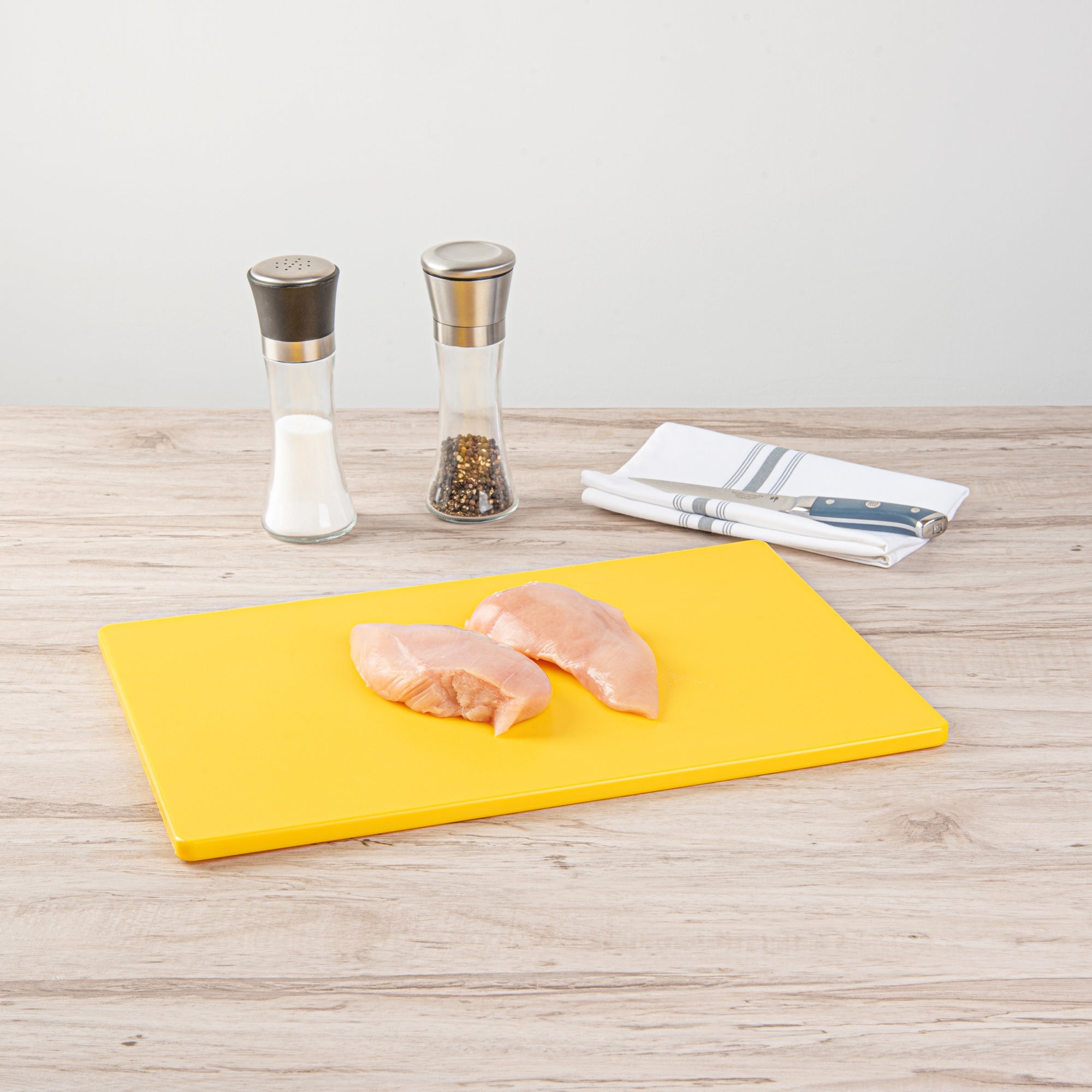 Chef 101 Yellow Plastic Cutting Board - 18" x 12" - 10 count box